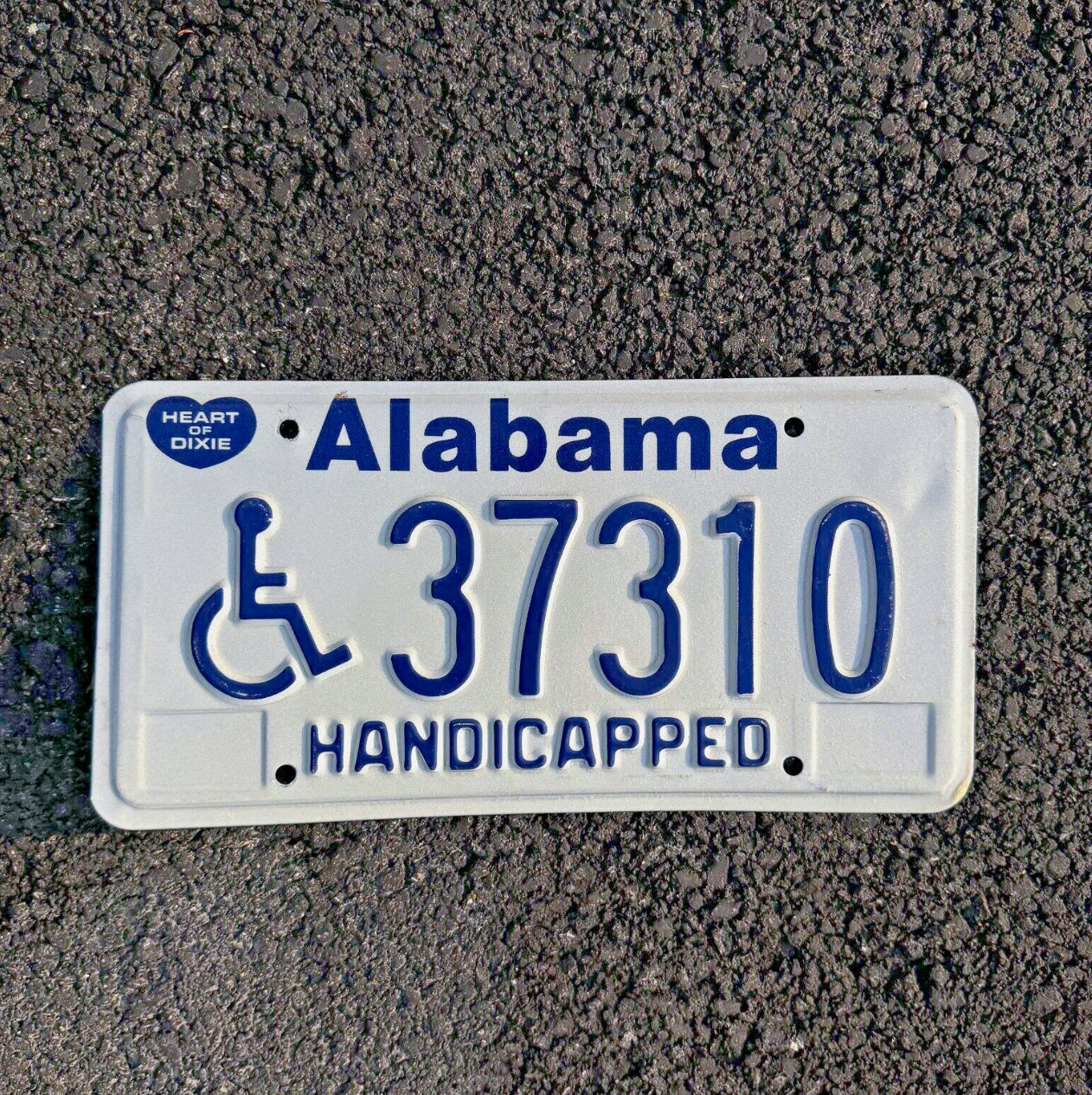 Photo of a 1989 Alabama Handicap Disabled License Plate Auto Tag Garage Decor Vintage Heart of Dixie 37310