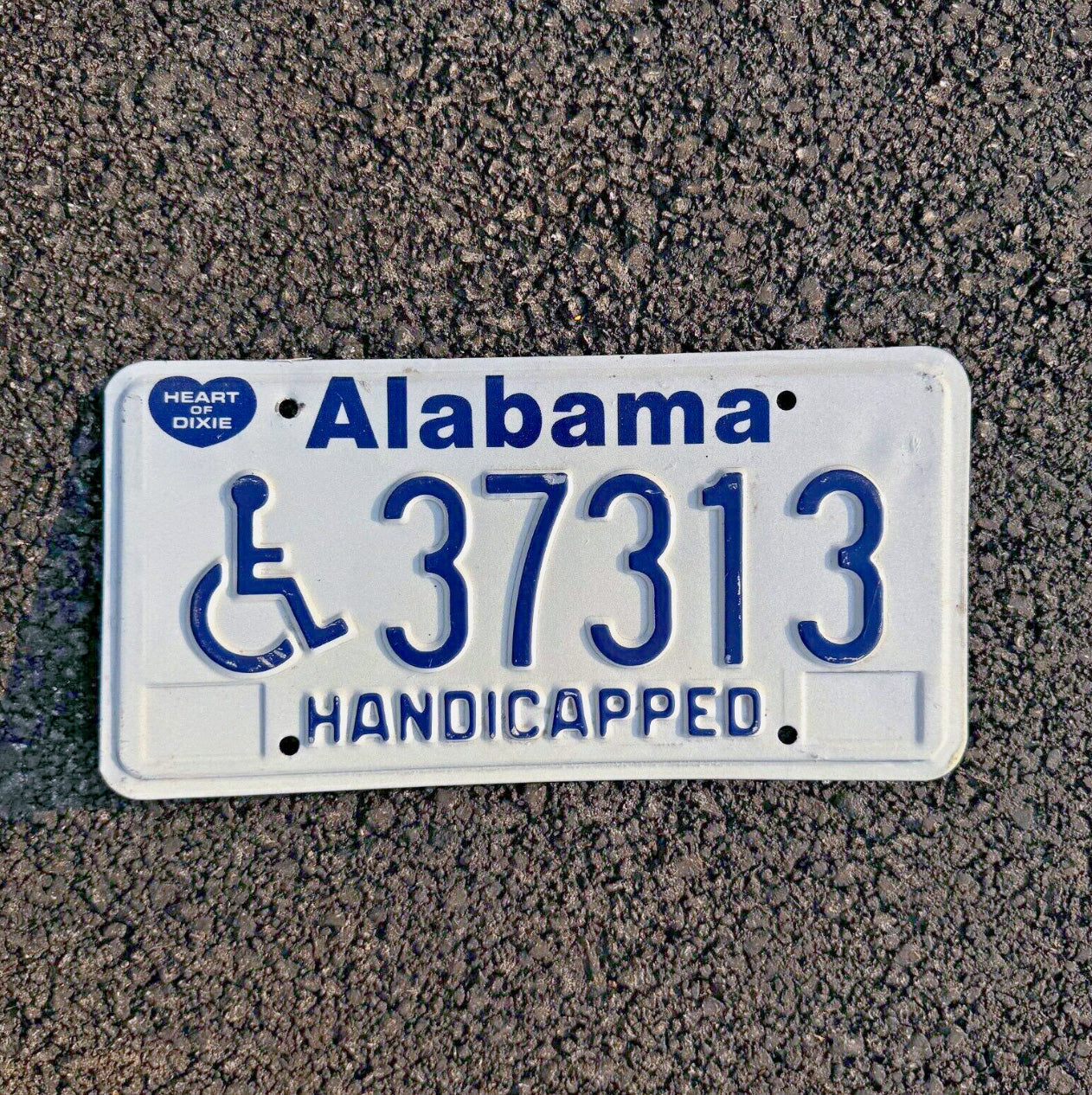 Photo of a 1989 Alabama Handicap Disabled License Plate Auto Tag Garage Decor Vintage Heart of Dixie 37313