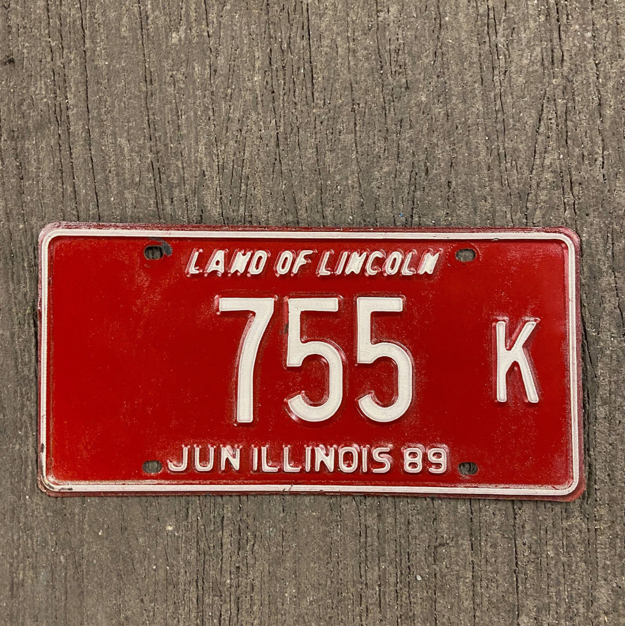 Photo of a 1989 Illinois Truck License Plate Auto Tag Garage Decor Vintage 755 K with original patina