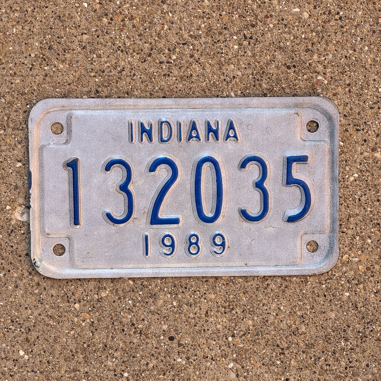 Photo of a 1989 Indiana Motorcycle License Plate Auto Tag Garage Decor Vintage 132035