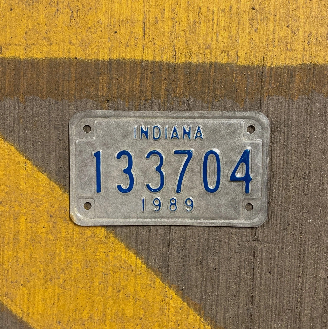 Photo of a 1989 Indiana Motorcycle License Plate Auto Tag Garage Decor Vintage 133704