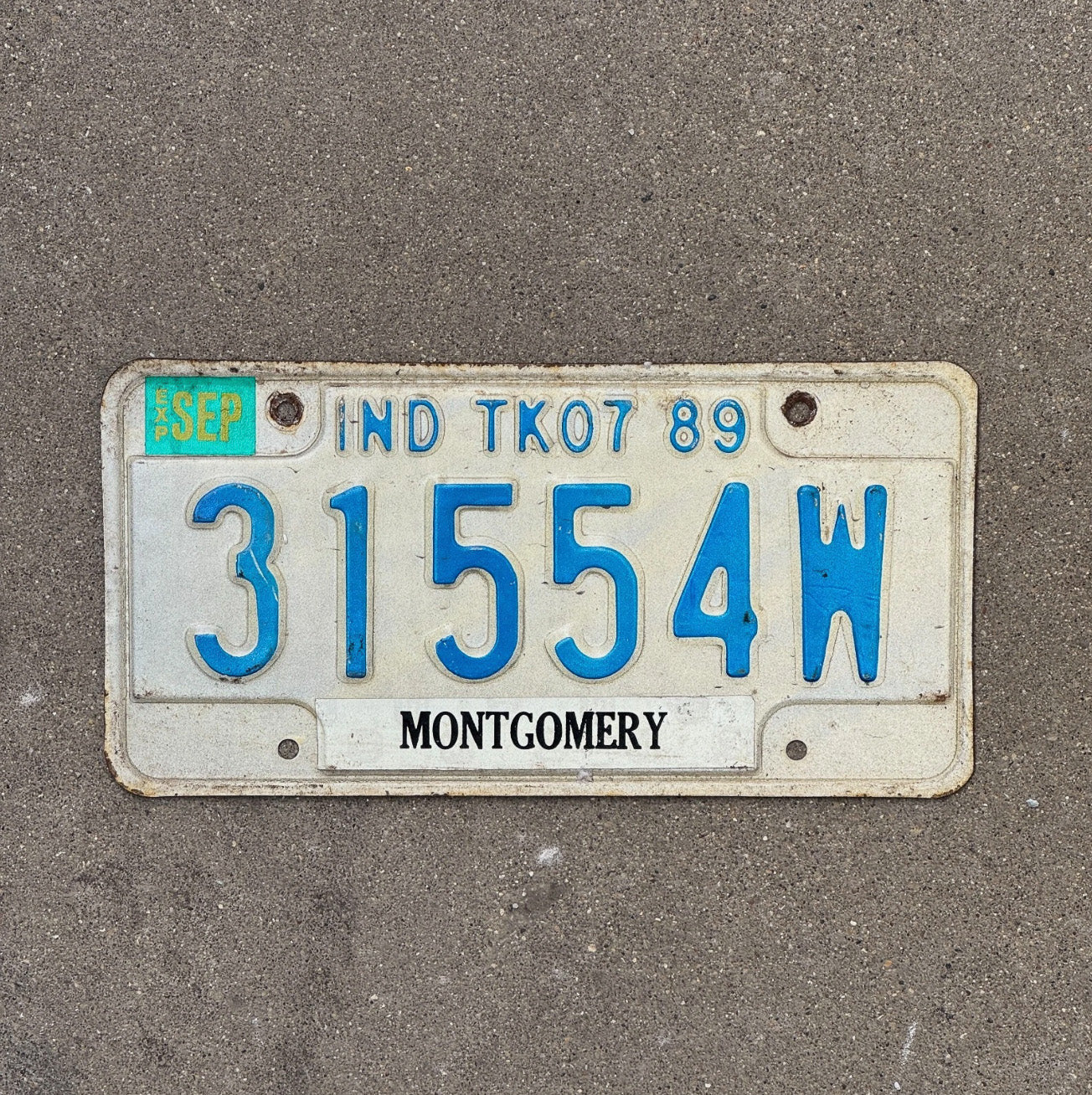 Photo of a 1989 Indiana Truck License Plate Auto Tag Garage Decor 31554 W