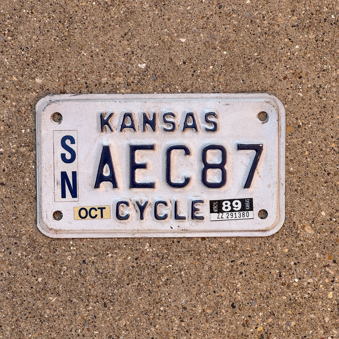 Photo of a 1989 Kansas Motorcycle License Plate Auto Tag Garage Decor Vintage AEC87