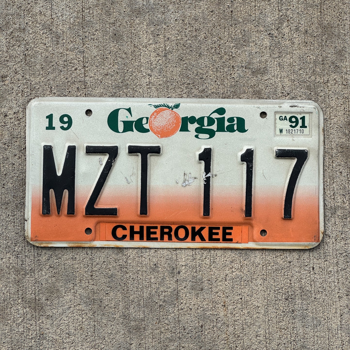 Photo of a 1990 1991 Georgia License Plate Auto Tag Garage Decor Vintage MZT 117 with original patina