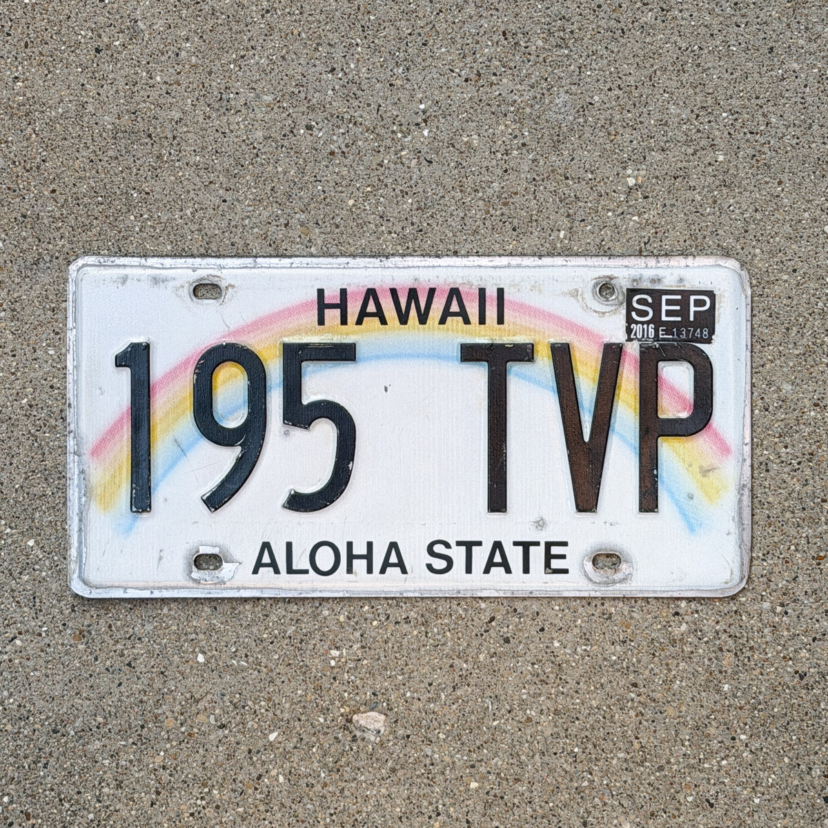 Photo of a 1990 2016 Hawaii License Plate Auto Tag Garage Decor Vintage Rainbow 195 TVP with original patina