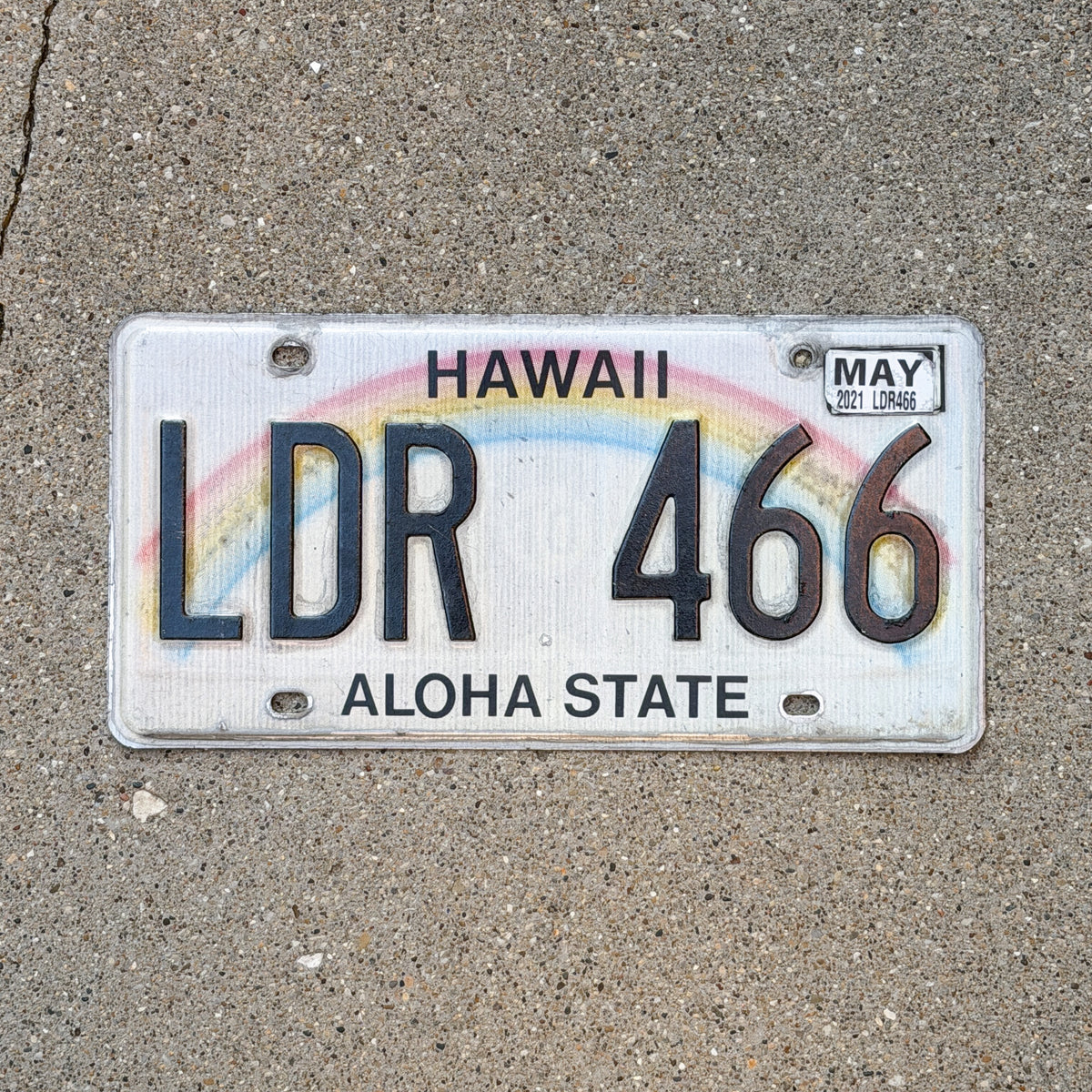 Photo of a 1990 2021 Hawaii License Plate Auto Tag 2 Vintage Rainbow LDR 466 with original patina