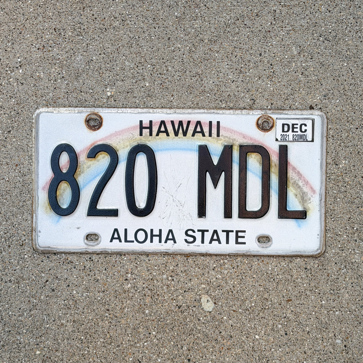 Photo of a 1990 2021 Hawaii License Plate Auto Tag Garage Decor Vintage Rainbow 820 MDL with original patina