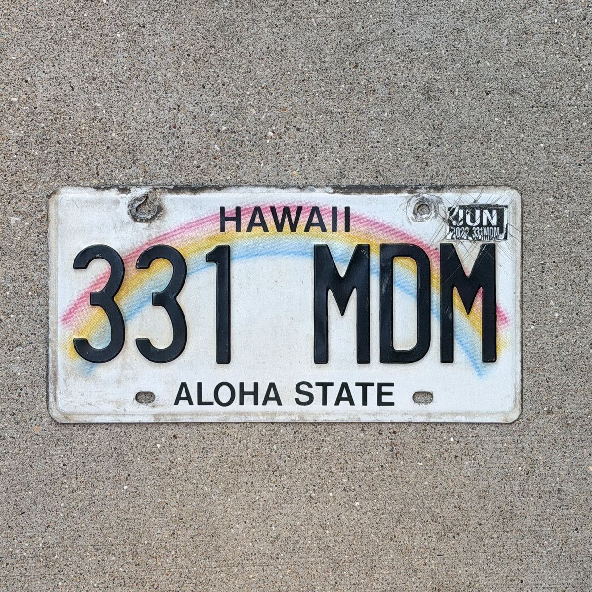 Photo of a 1990 2022 Hawaii License Plate Auto Tag Garage Decor Vintage Rainbow 331 MDM with original patina