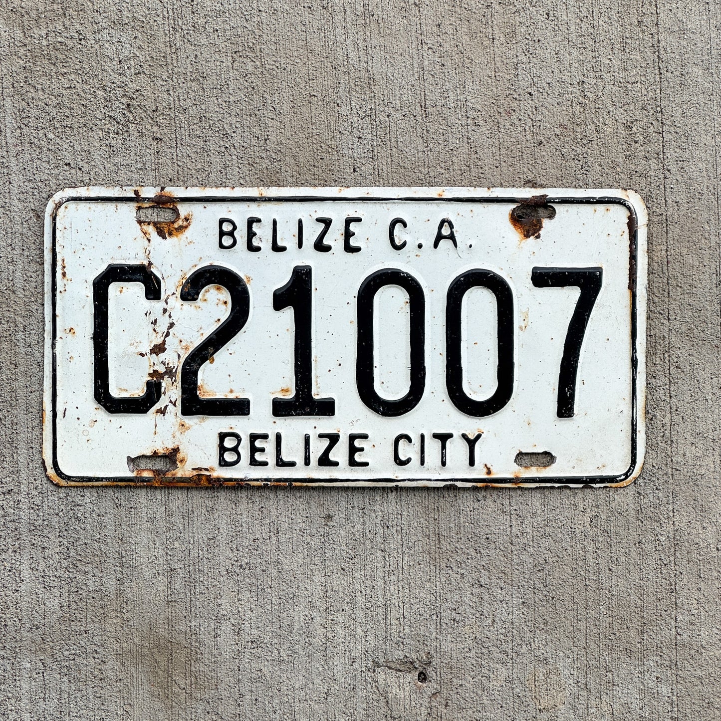 Photo of a 1990 Era Belize License Plate Auto Tag Garage Decor Vintage C 21007 with original patina