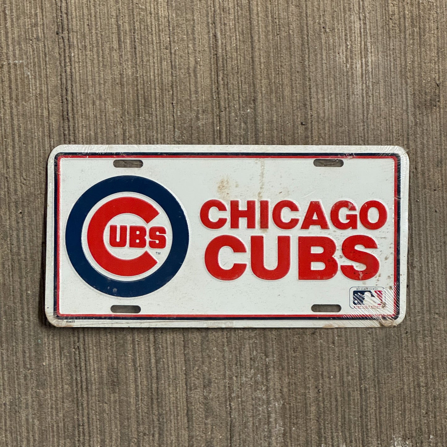 Photo of a 1990 Era Illinois Booster License Plate Auto Tag 1 Vintage Garage Metal MLB Baseball Chicago Cubs with original patina