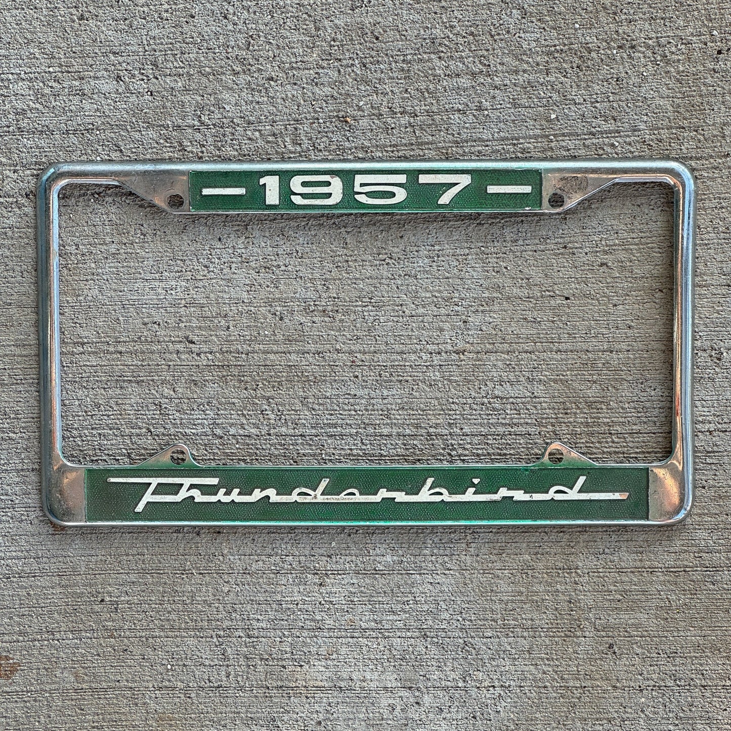 Photo of a 1990 Era License Plate Frame Auto Tag Garage Decor Vintage Classic Car 1957 Thunderbird