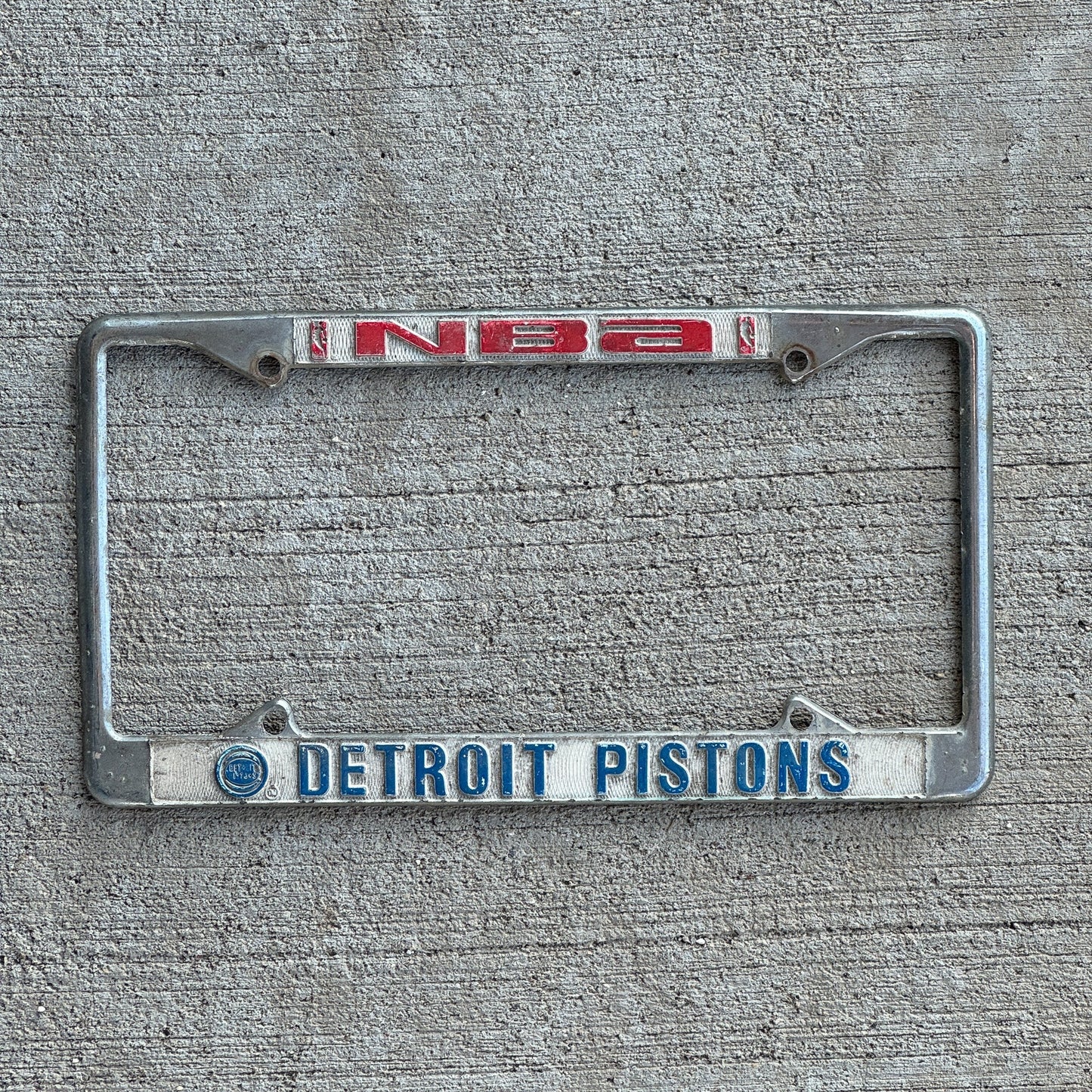 Photo of a 1990 Era Michigan License Plate Frame Auto Tag Garage Decor Vintage NBA Basketball Detroit Pistons