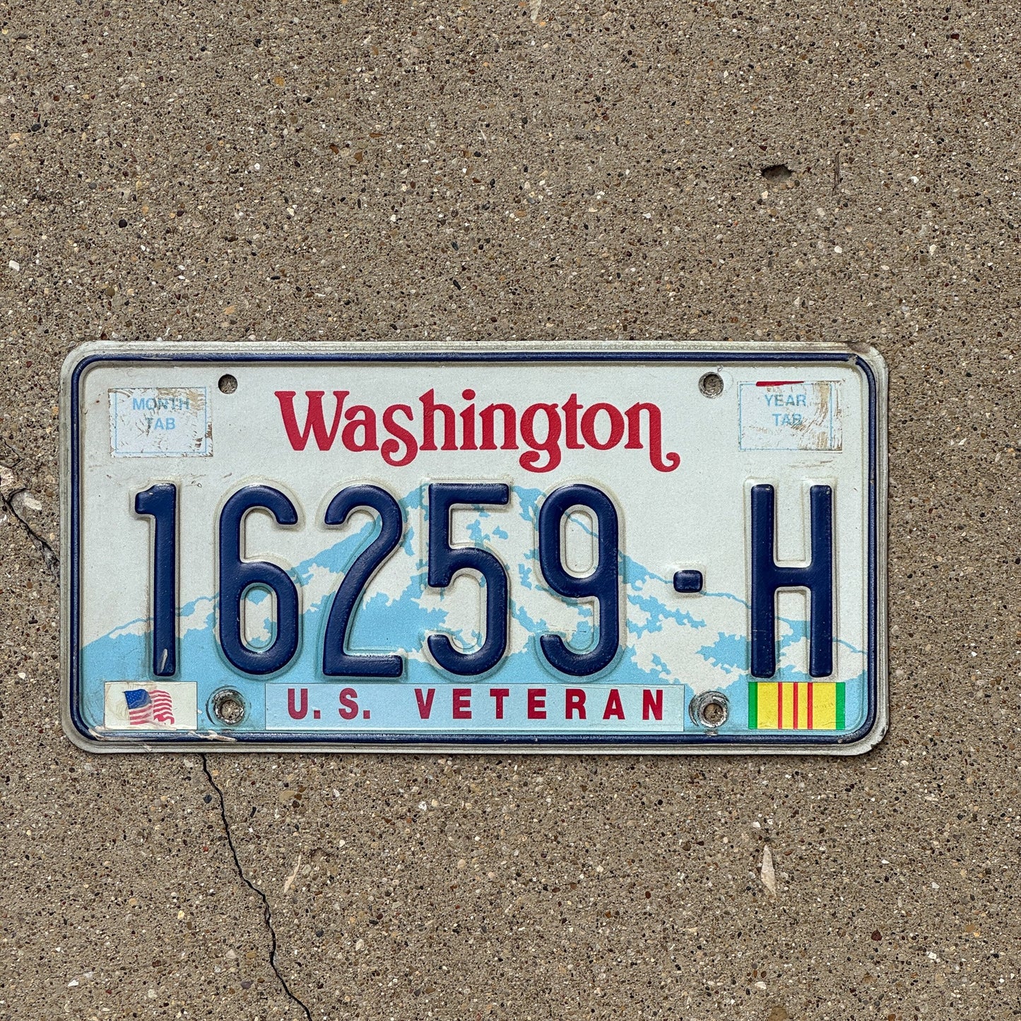 Photo of a 1990 Era Washington Veteran License Plate Auto Tag Garage Decor Vintage Vietnam Veteran 16259 H
