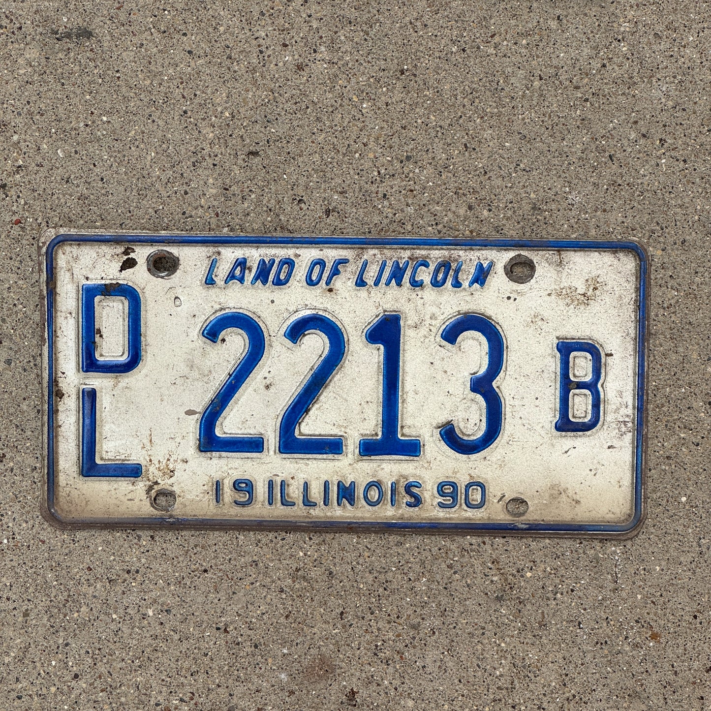 Photo of a 1990 Illinois Dealer License Plate Auto Tag 1 Vintage Garage 2213 B with original patina