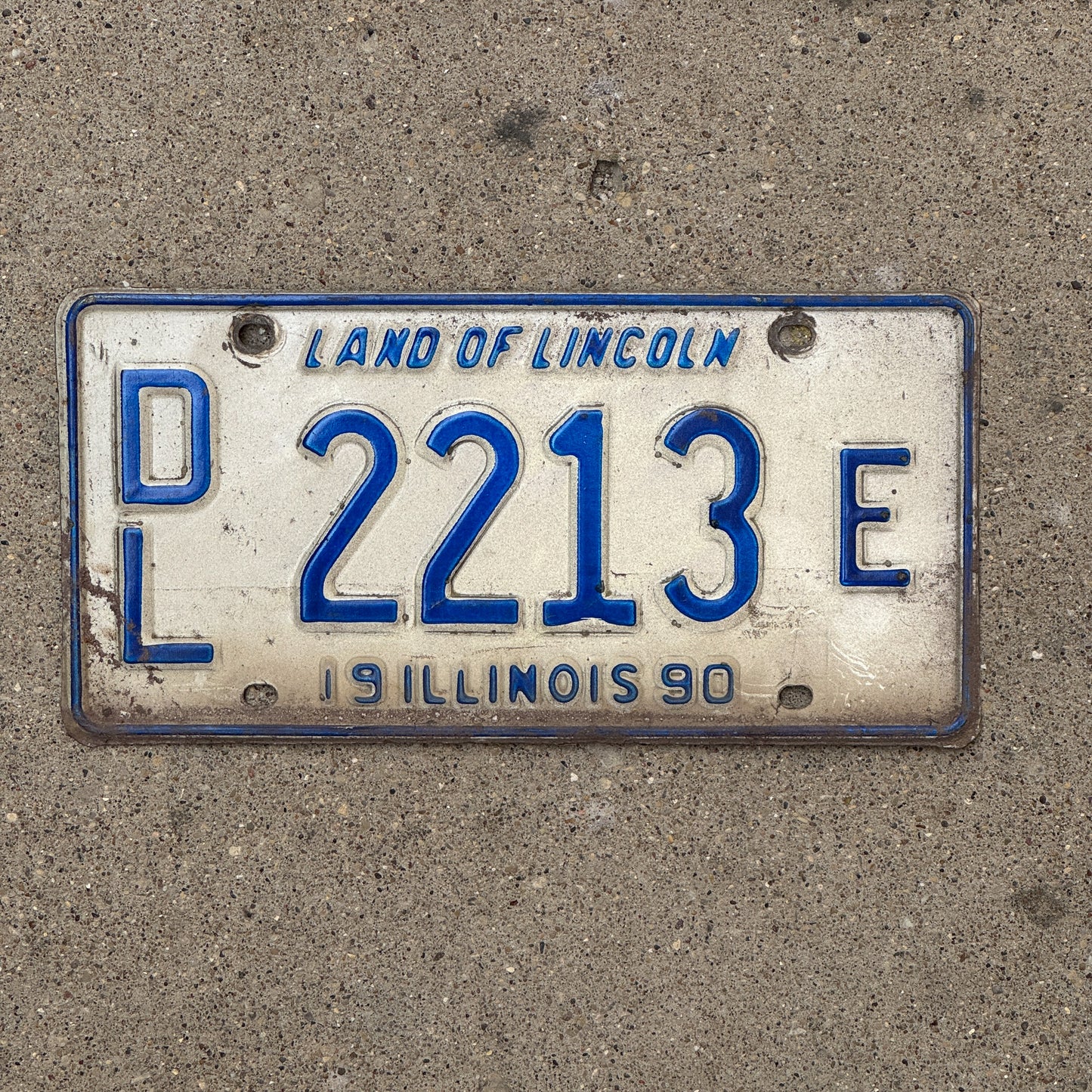 Photo of a 1990 Illinois Dealer License Plate Auto Tag 1 Vintage Garage 2213 E with original patina