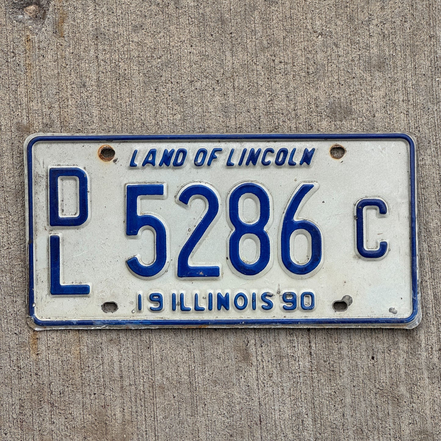 Photo of a 1990 Illinois Dealer License Plate Auto Tag 1 Vintage Garage 5286 C with original patina