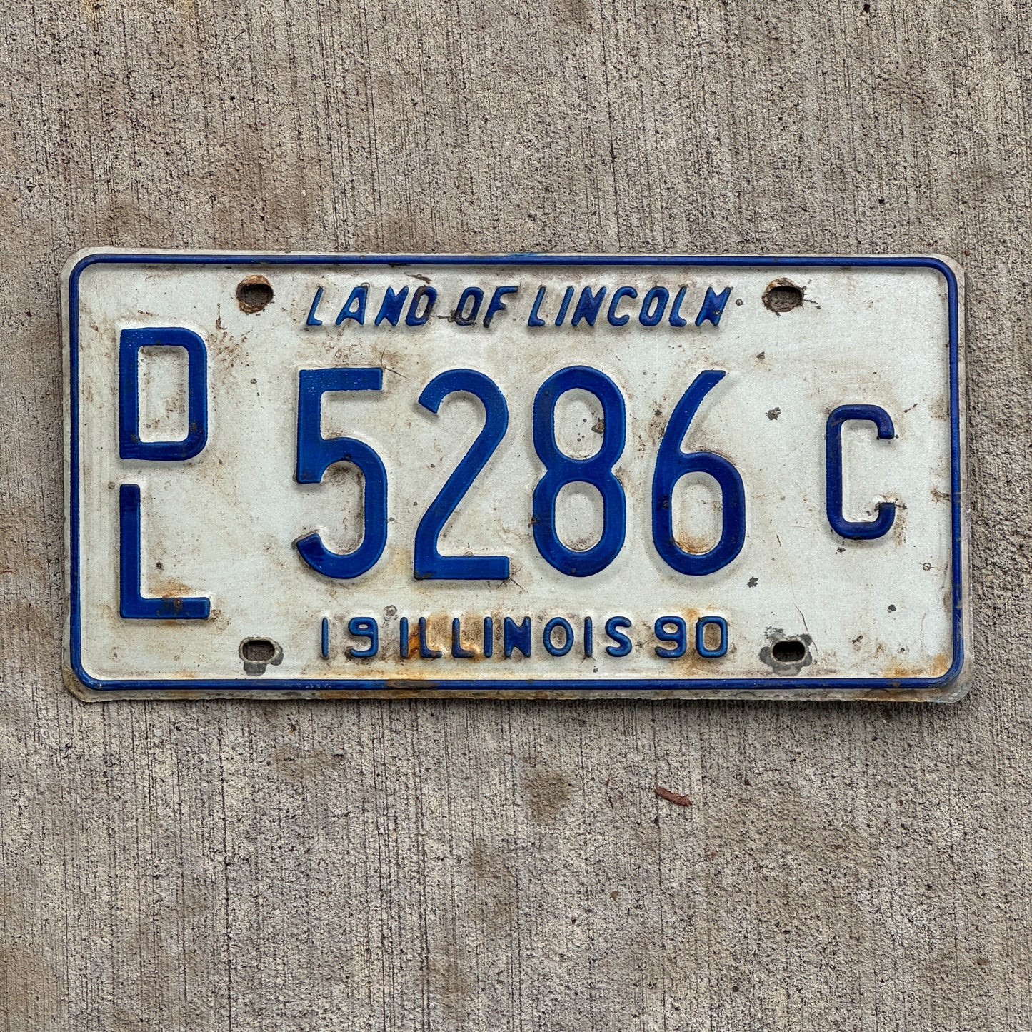 Photo of a 1990 Illinois Dealer License Plate Auto Tag 2 Vintage Garage 5286 C with original patina