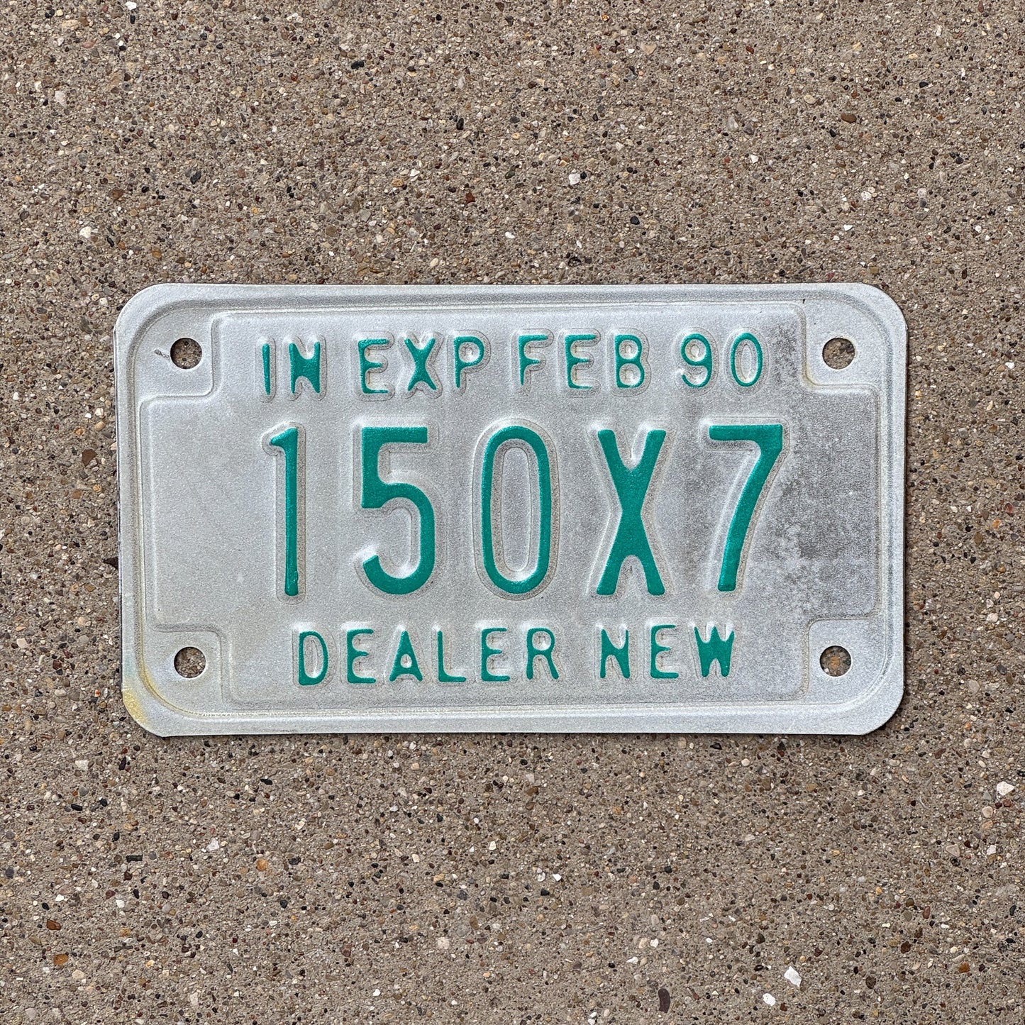 Photo of a 1990 Indiana Motorcycle Dealer License Plate Auto Tag Garage Decor Vintage 150 X 7 with original patina