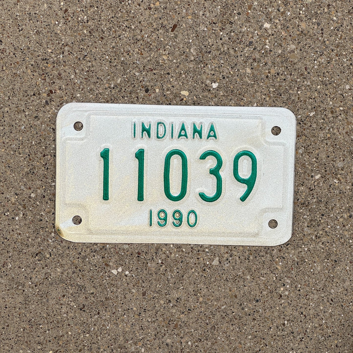 Photo of a 1990 Indiana Motorcycle License Plate Auto Tag Garage Decor Vintage 11039