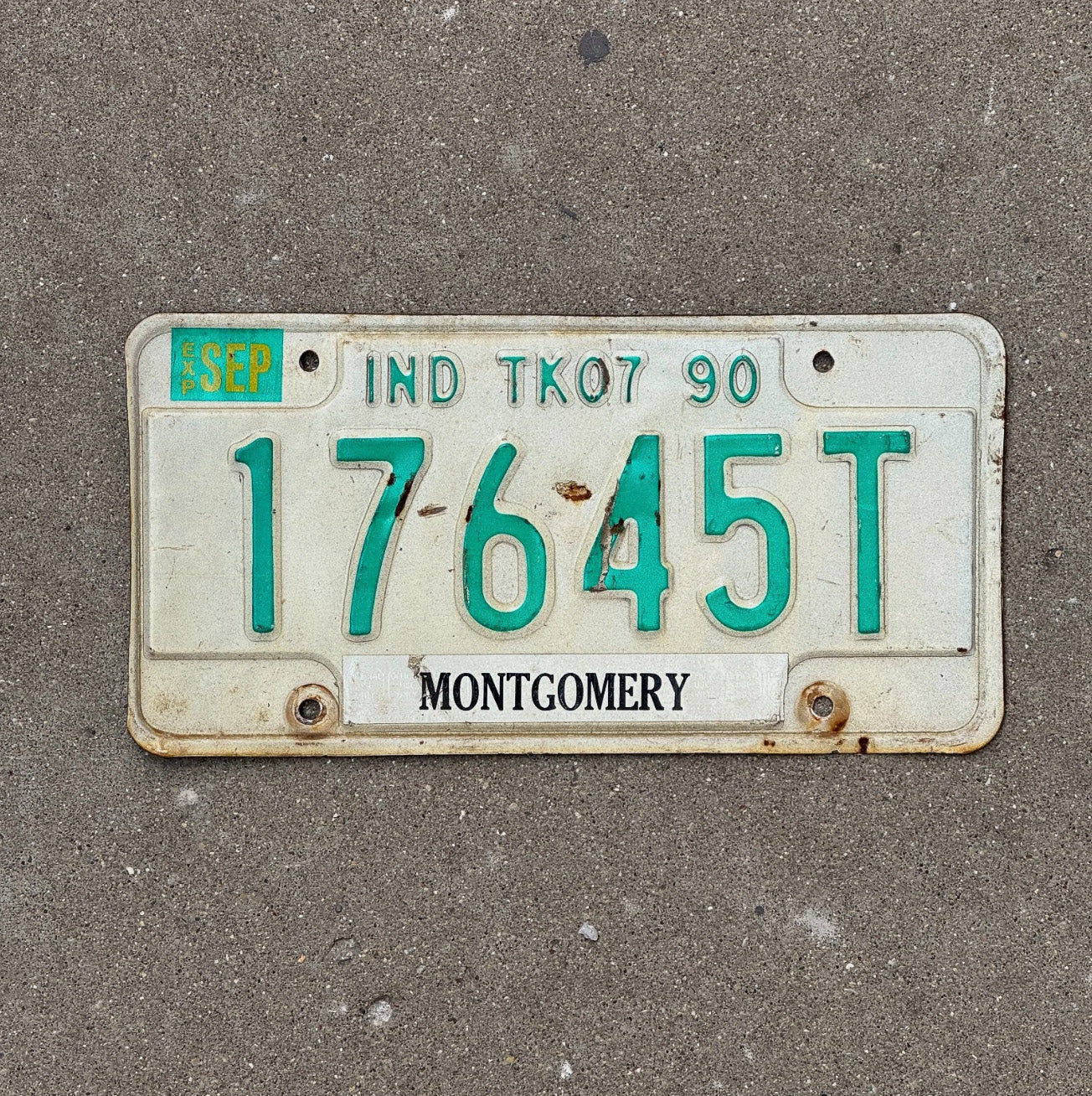 Photo of a 1990 Indiana Truck License Plate Auto Tag Garage Decor 17645 T