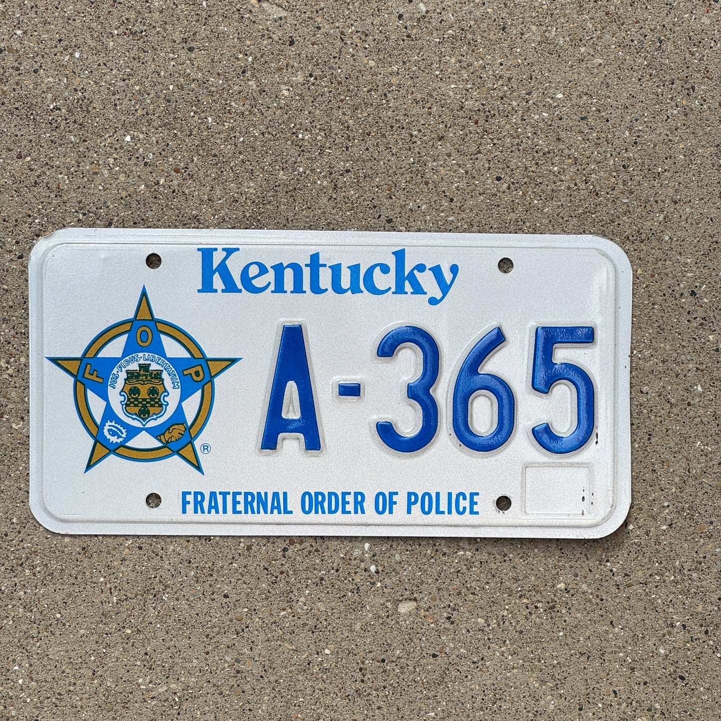 Photo of a 1990 Kentucky Graphic / Specialty License Plate Auto Tag Garage Decor Vintage Fraternal Order of Police A 365