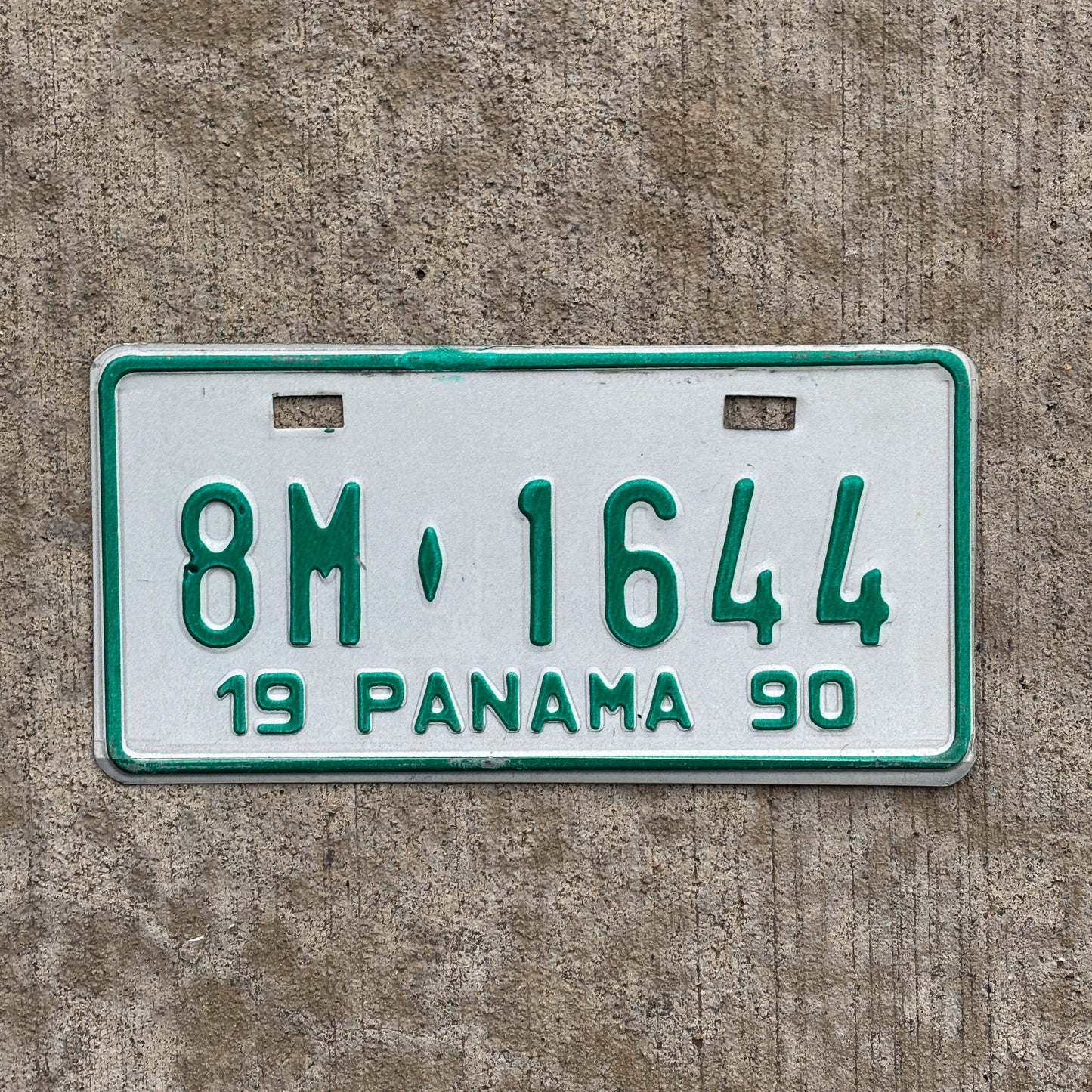 Photo of a 1990 Panama Motorcycle License Plate Auto Tag Garage Decor Vintage 8M 1644 with original patina