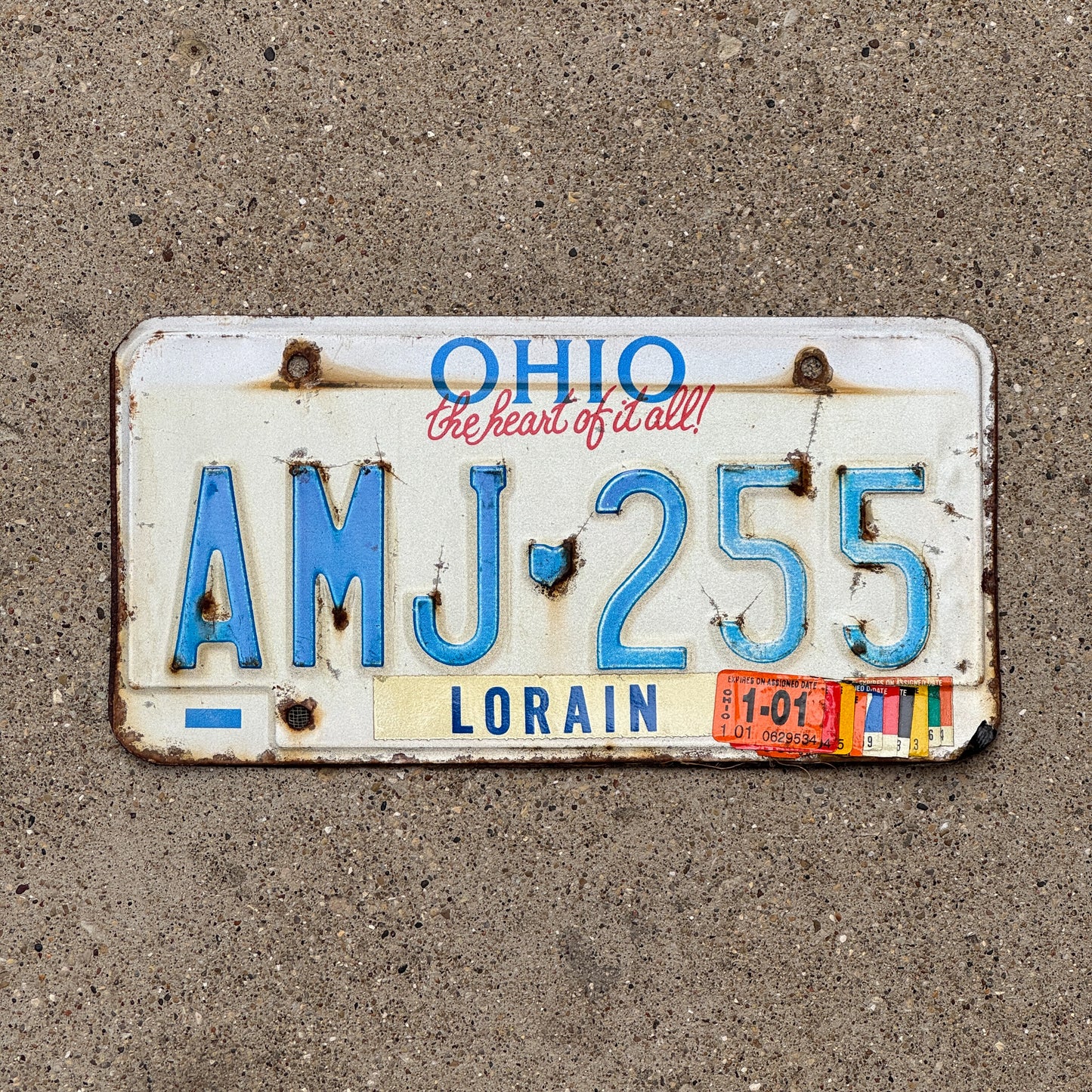 Photo of a 1991 2001 Ohio License Plate Auto Tag 2 Vintage Garage AMJ 255 with original patina