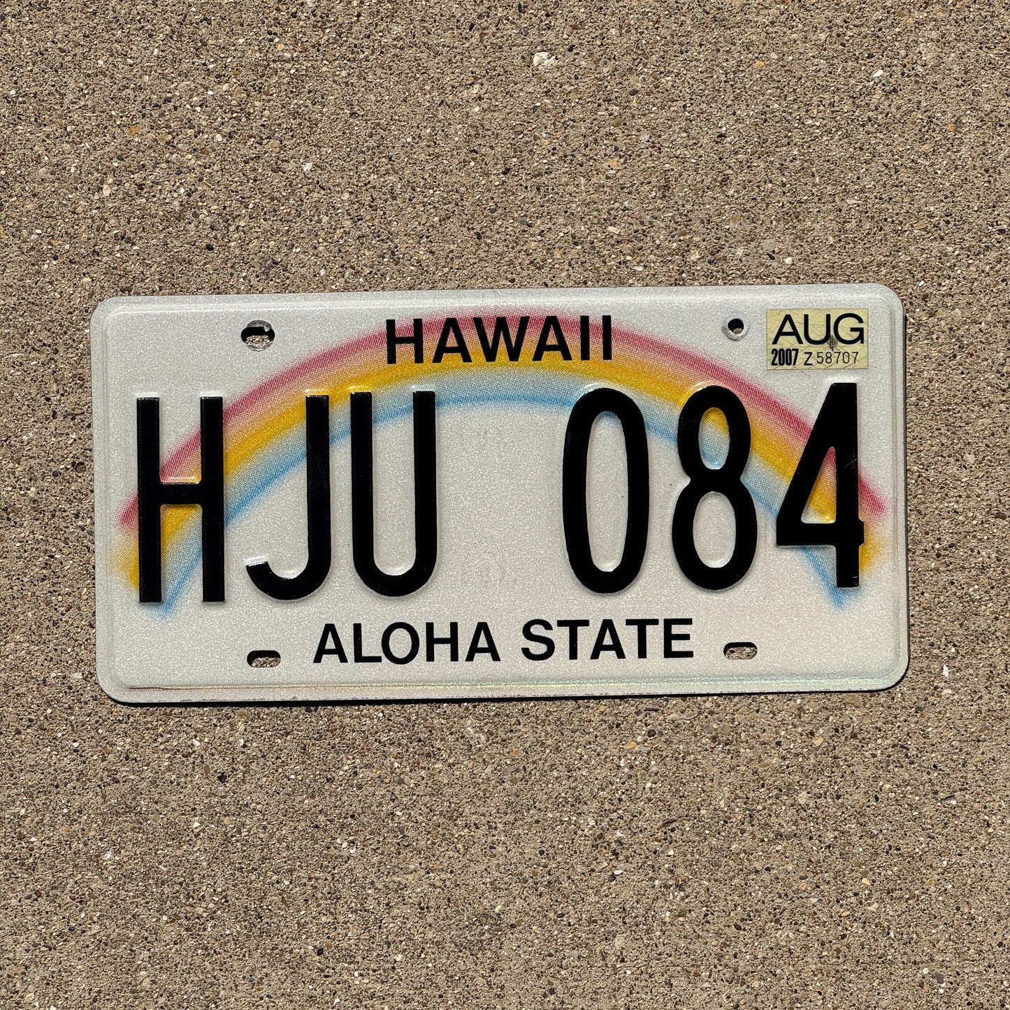 Photo of a 1991 Hawaii License Plate Auto Tag Garage Decor Vintage Rainbow HJU 084