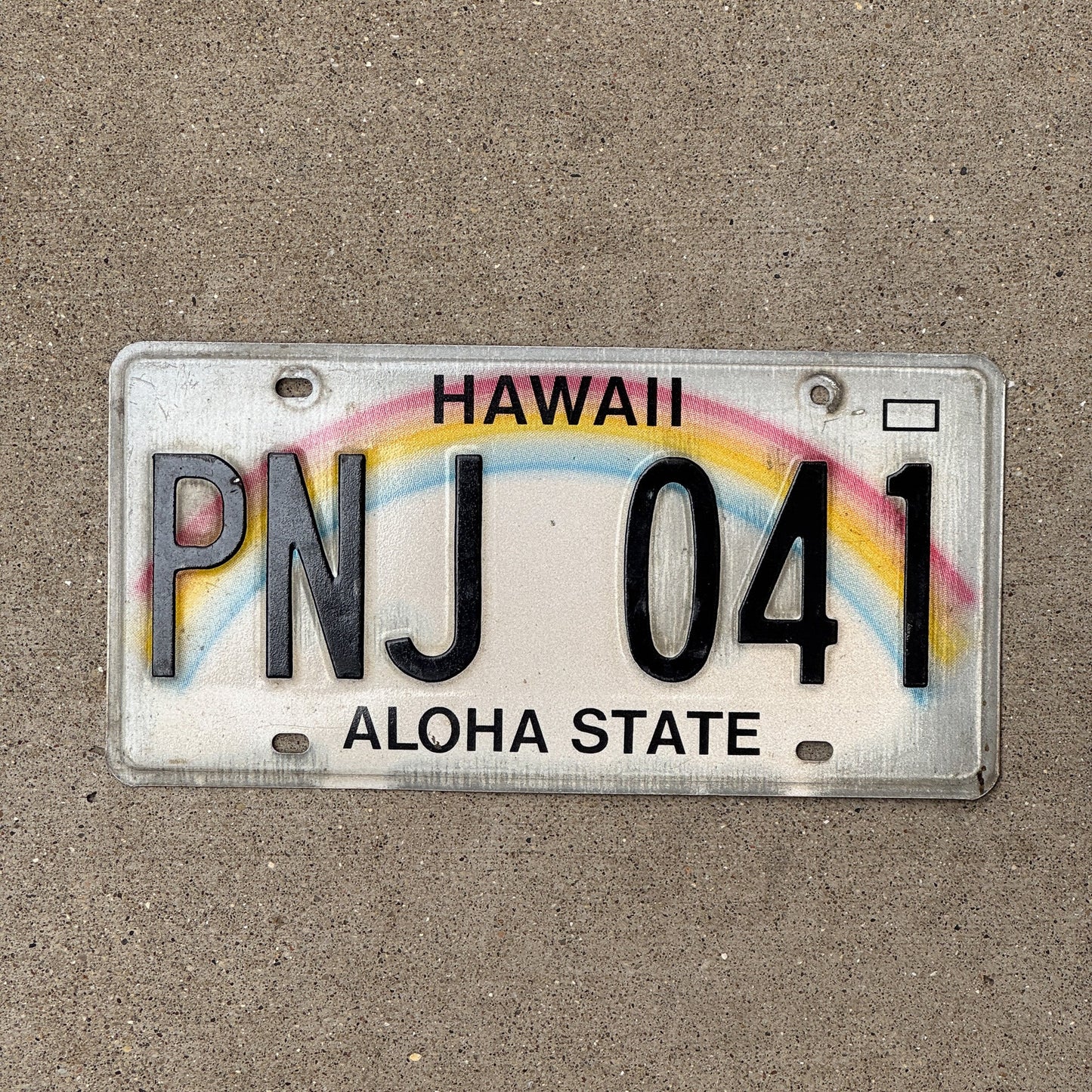 Photo of a 1991 Hawaii License Plate Auto Tag Garage Decor Vintage Rainbow PNJ 041