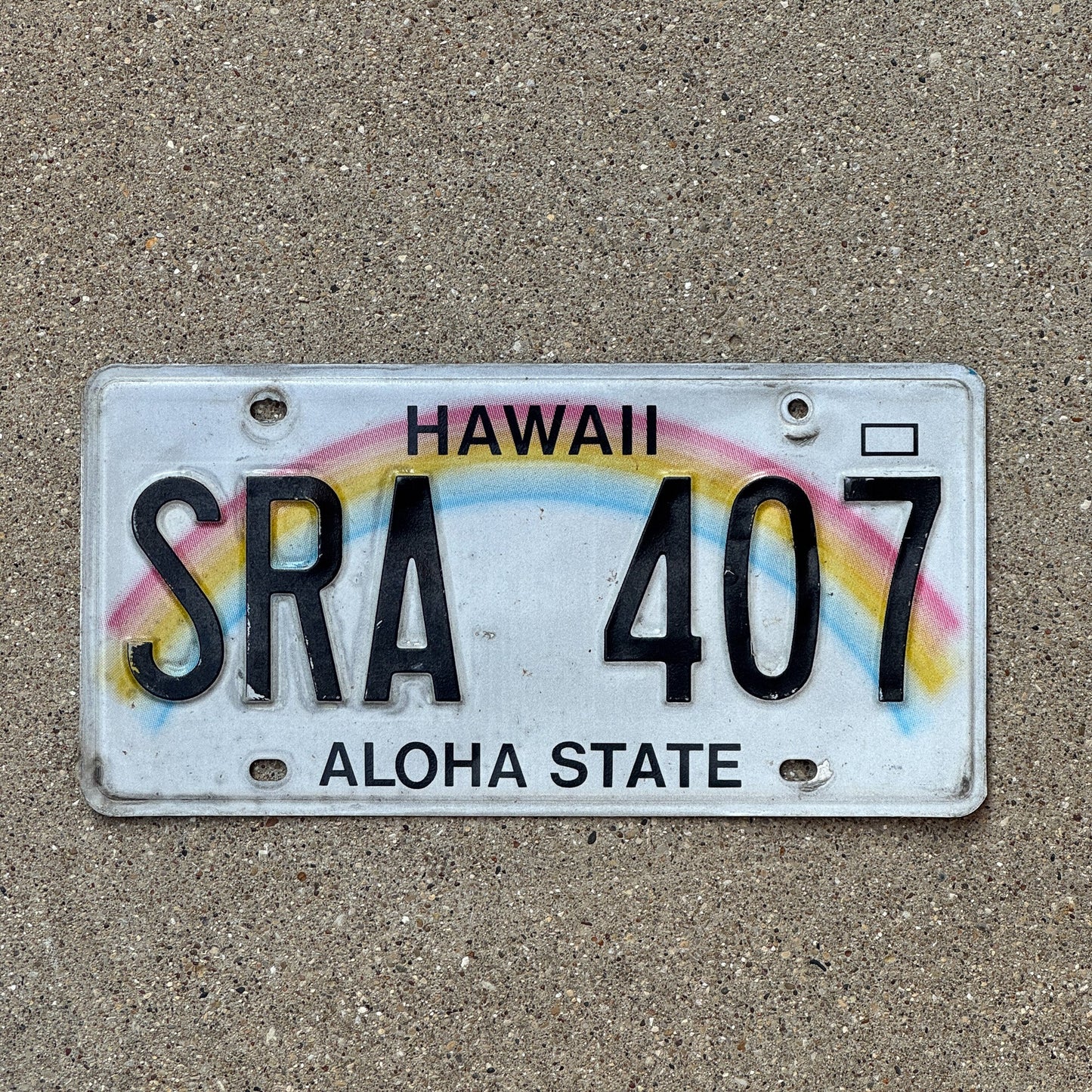 Photo of a 1991 Hawaii License Plate Auto Tag Garage Decor Vintage Rainbow SRA 407