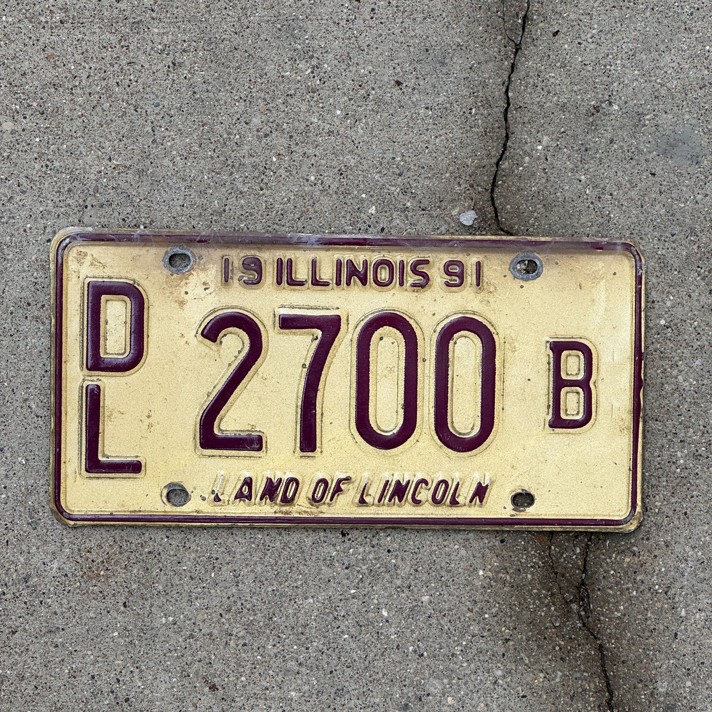 Photo of a 1991 Illinois Dealer License Plate Auto Tag 1 Vintage Garage 2700 B with original patina