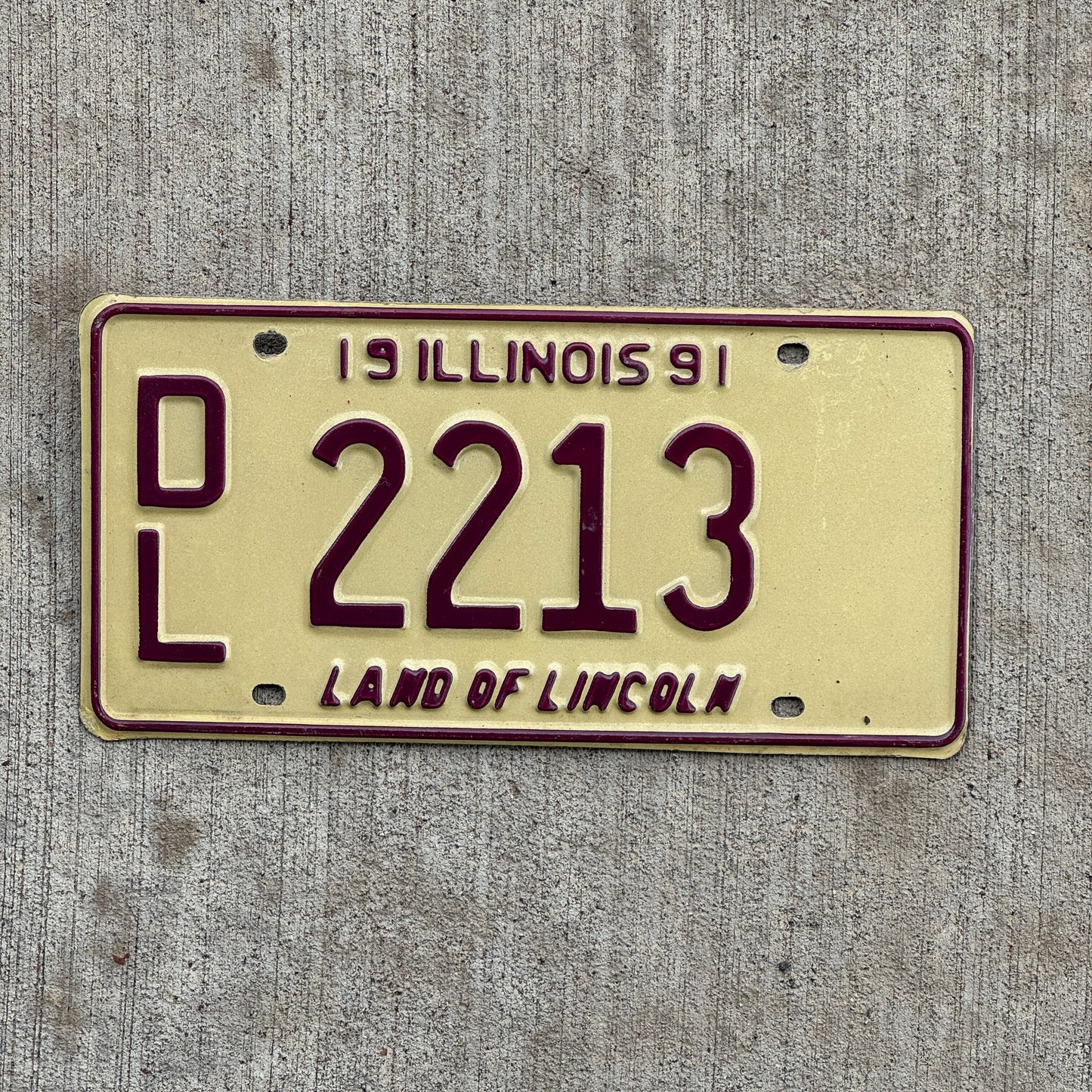 Photo of a 1991 Illinois Dealer License Plate Auto Tag 2 Vintage Garage 2213 with original patina