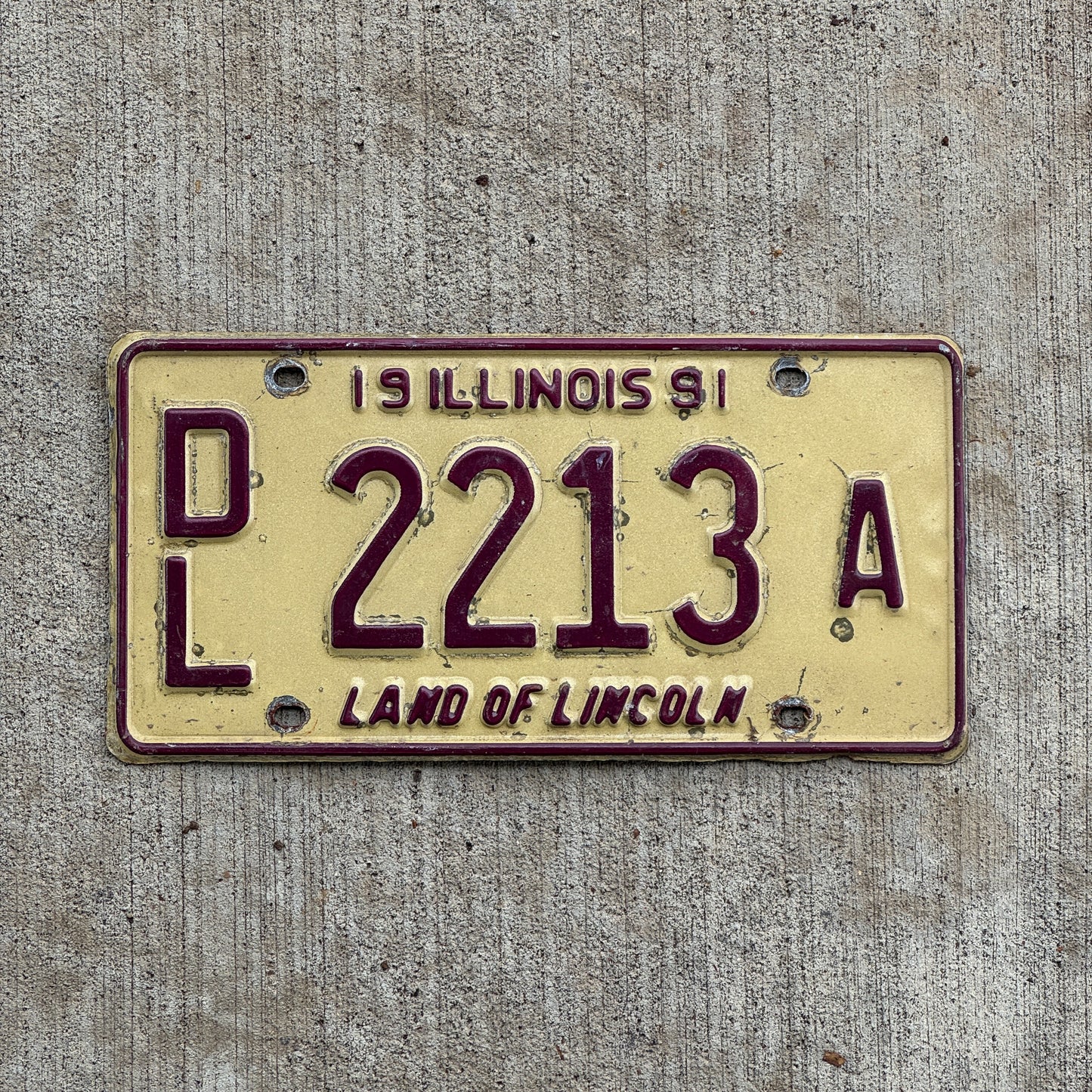Photo of a 1991 Illinois Dealer License Plate Auto Tag 2 Vintage Garage 2213 A with original patina