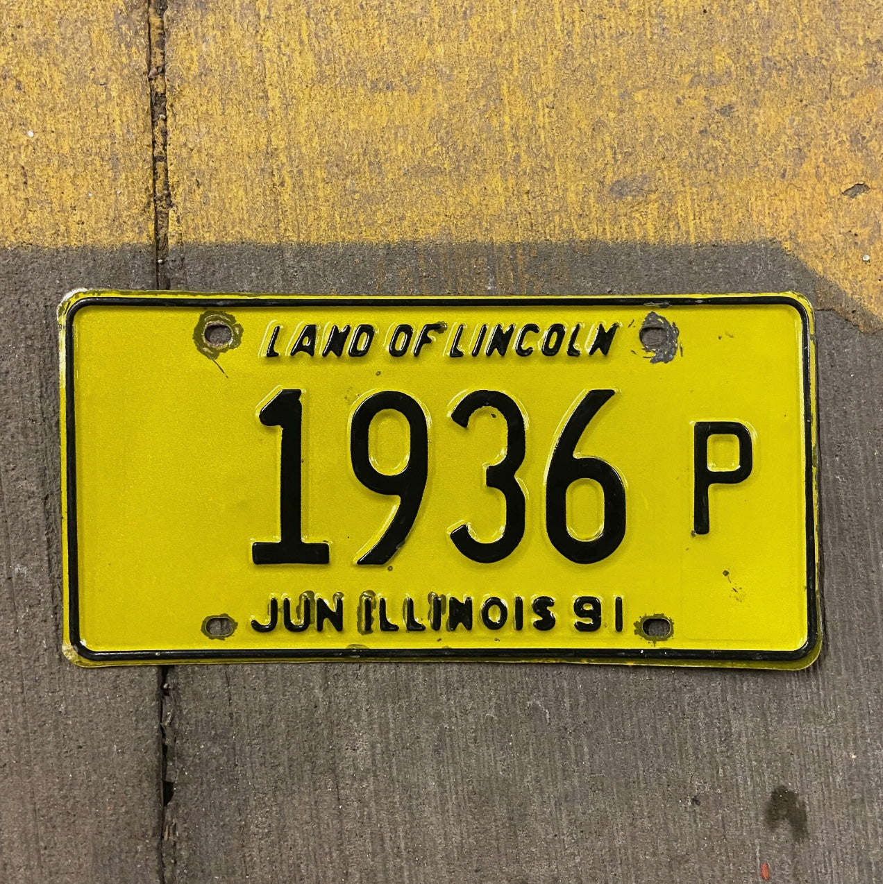 Photo of a 1991 Illinois Truck License Plate Auto Tag Garage Decor Vintage 1936 P with original patina