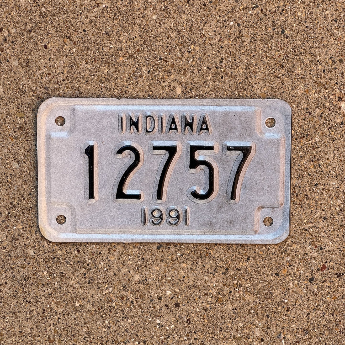 Photo of a 1991 Indiana Motorcycle License Plate Auto Tag Garage Decor Vintage 12757