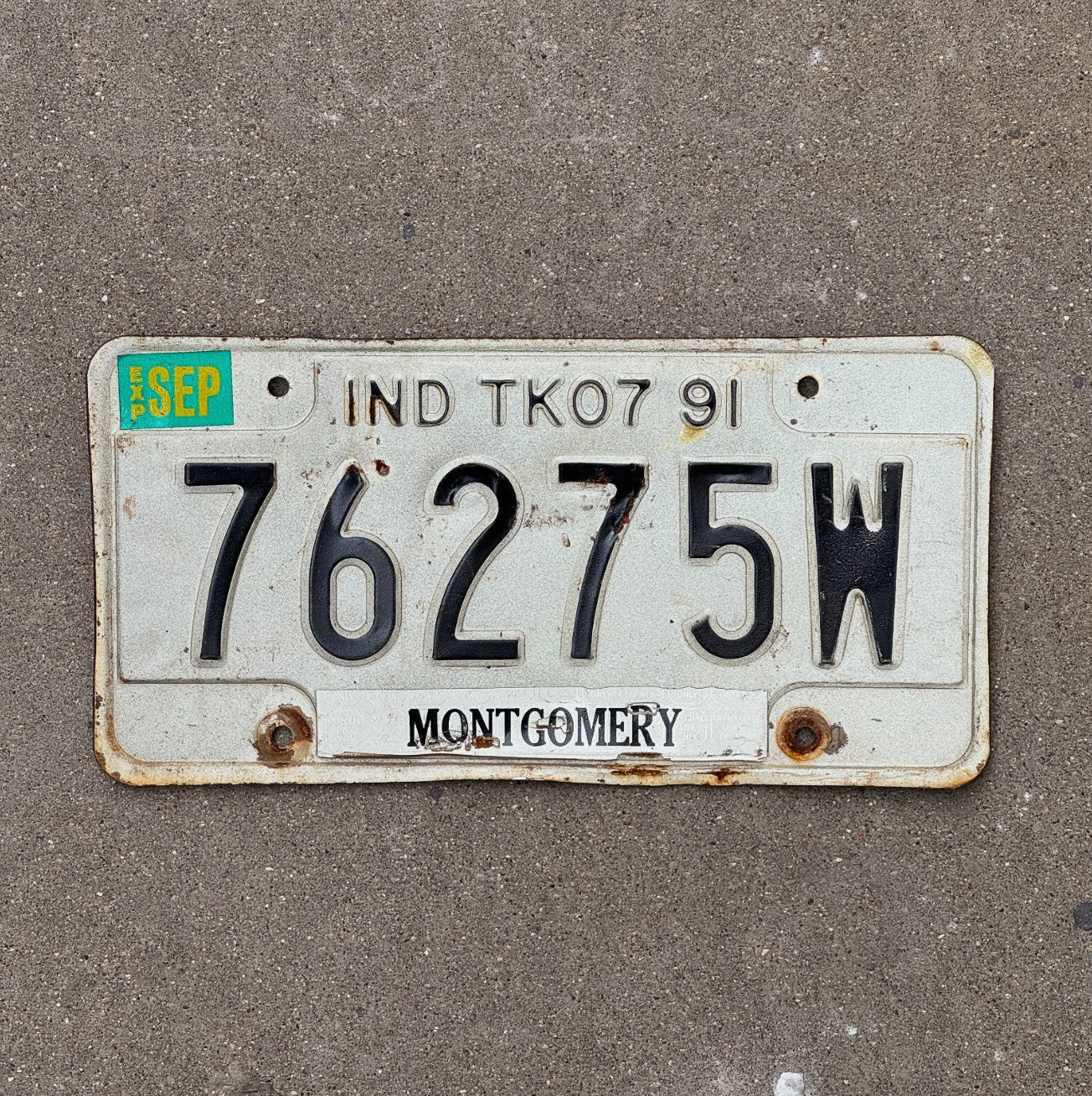 Photo of a 1991 Indiana Truck License Plate Auto Tag Garage Decor 76275 W