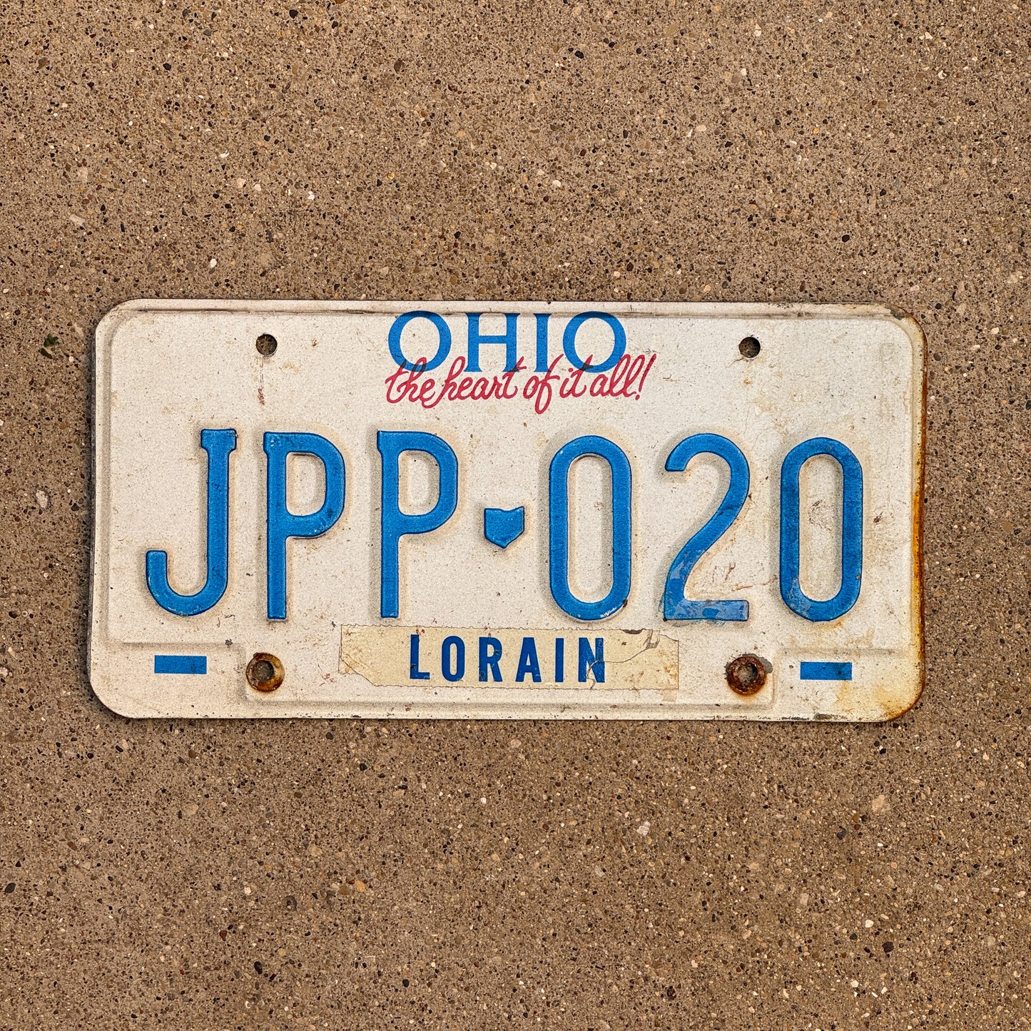 Photo of a 1991 Ohio License Plate Auto Tag 2 Vintage Garage JPP 020 with original patina