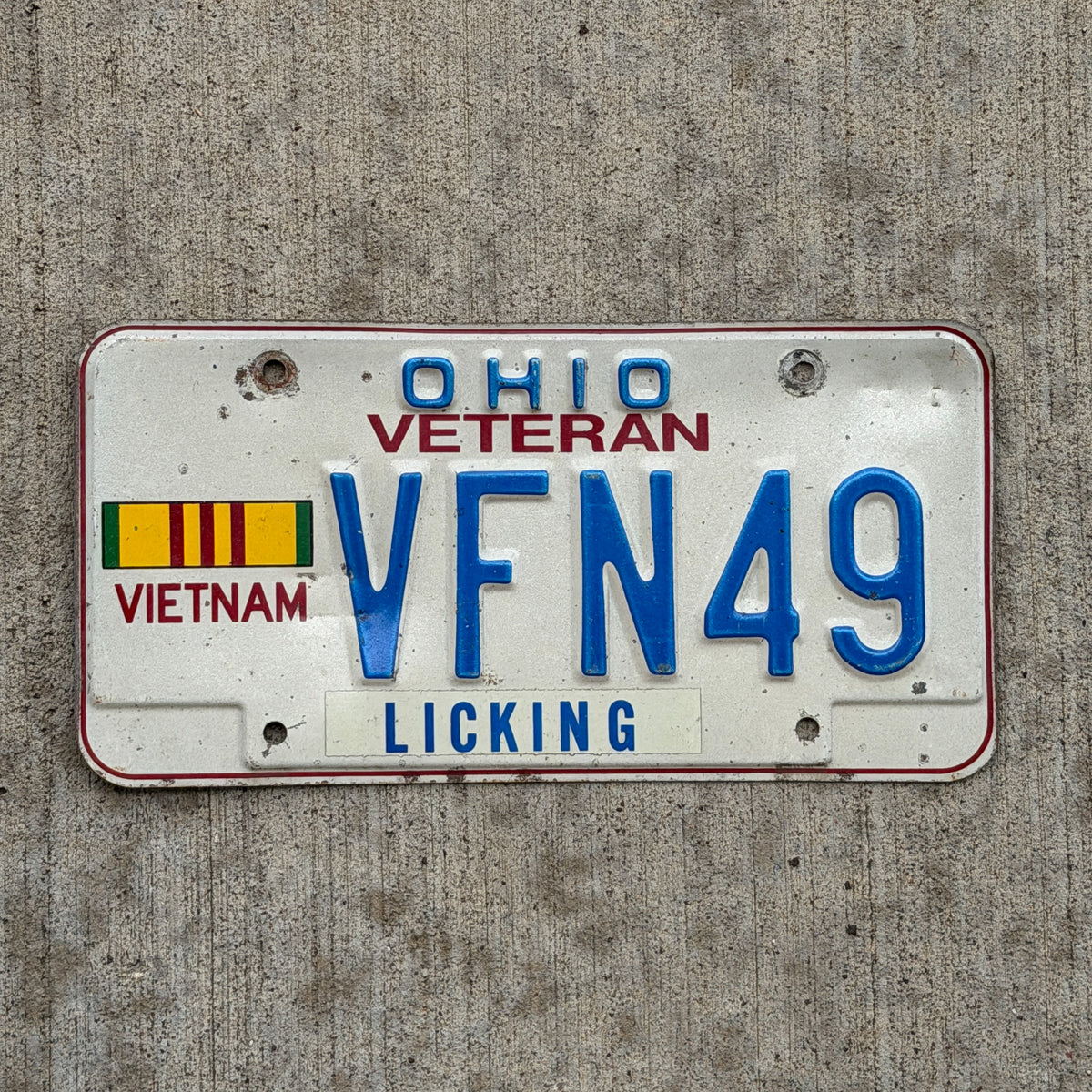 Photo of a 1991 Ohio Veteran License Plate Auto Tag Garage Decor Vintage Vietnam VFN 49 with original patina