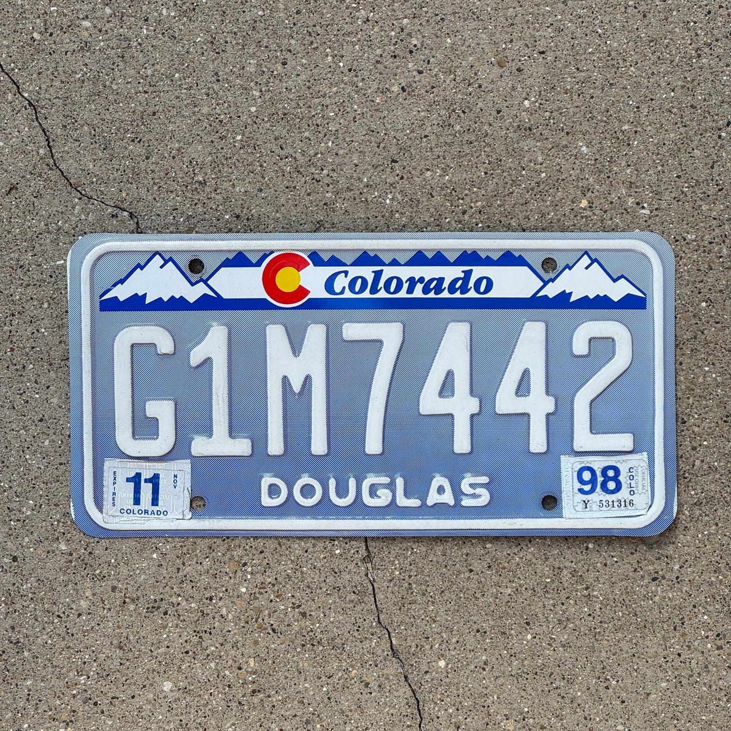 Photo of a 1992 1998 Colorado Denim License Plate Auto Tag 1 Garage Decor Designer Base G1M 7442