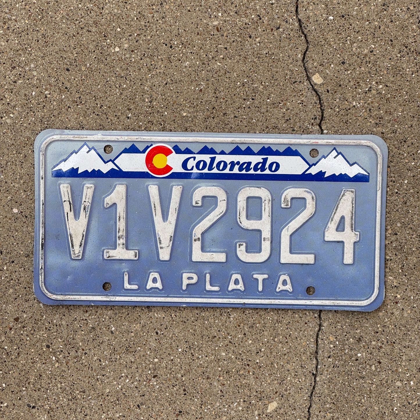 Photo of a 1992 Colorado Denim License Plate Auto Tag Garage Decor Vintage Designer Base V1V 2924
