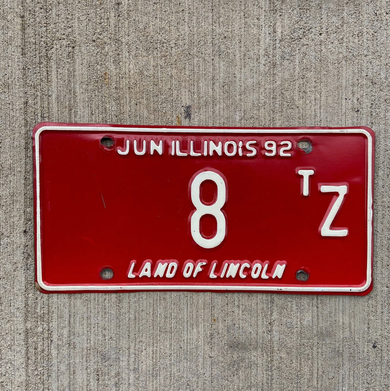 Photo of a 1992 Illinois Truck Tractor License Plate Auto Tag Garage Decor Vintage Low Number Single Digit 8 TZ with original patina