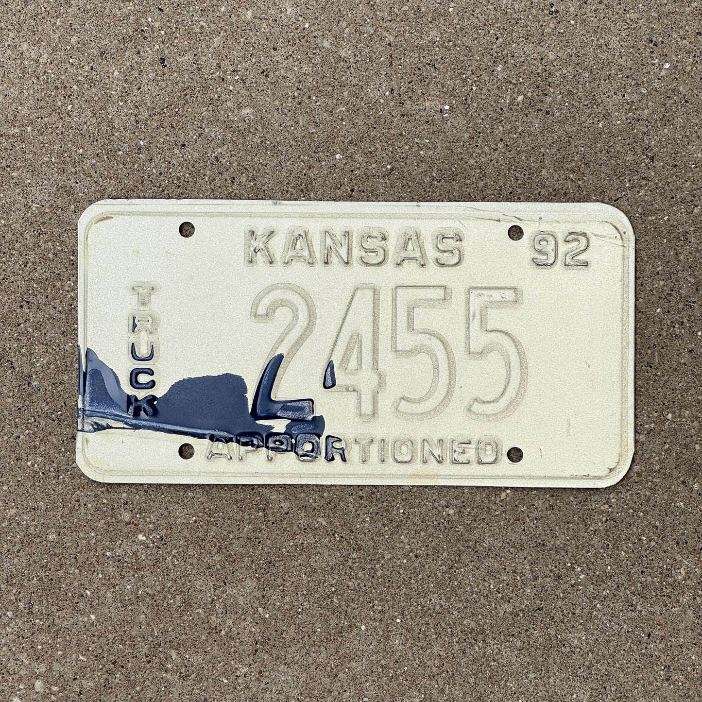 Photo of a 1992 Kansas Apportioned Truck Error License Plate Auto Tag Garage Decor Vintage Misprint 2455
