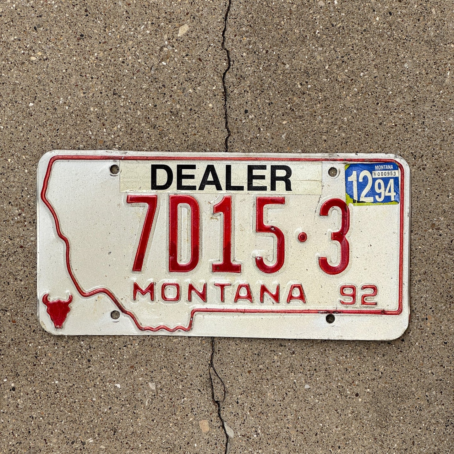 Photo of a 1992 Montana Dealer License Plate Auto Tag Garage Decor Vintage State Shape 7D 153
