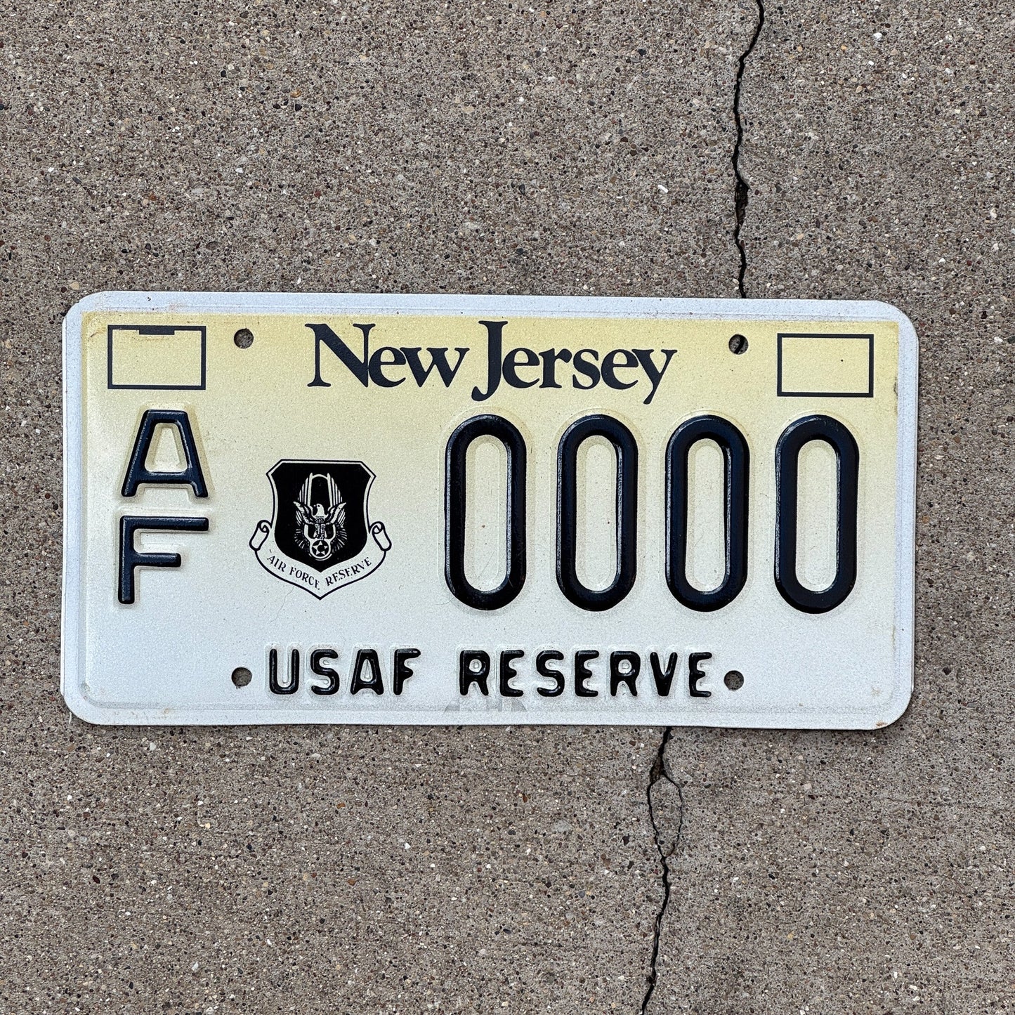 Photo of a 1992 New Jersey Graphic Sample License Plate Auto Tag Garage Decor Vintage US Airforce Reserve AF 0000