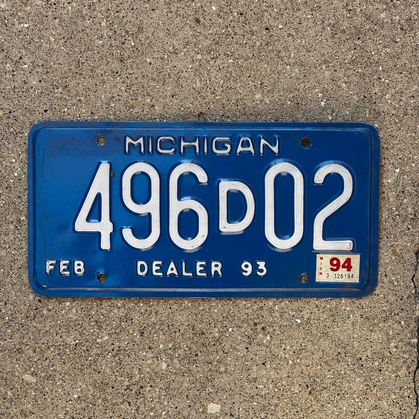 Photo of a 1993 1994 Michigan Dealer License Plate Auto Tag Garage Decor Vintage 496 D 02