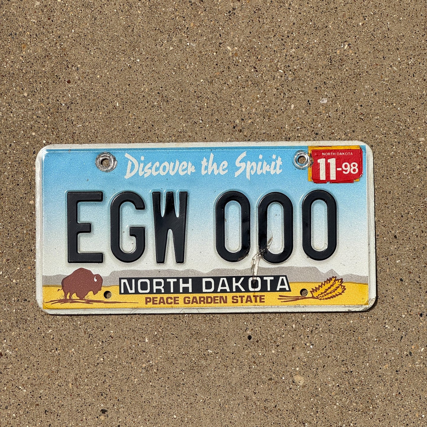Photo of a 1993 1998 North Dakota License Plate Auto Tag Garage Decor Vintage Repeat Repeating EGW 000