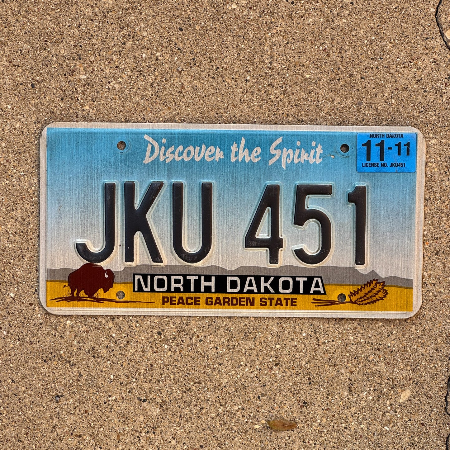 Photo of a 1993 2011 North Dakota License Plate Auto Tag Garage Decor Vintage JKU 451