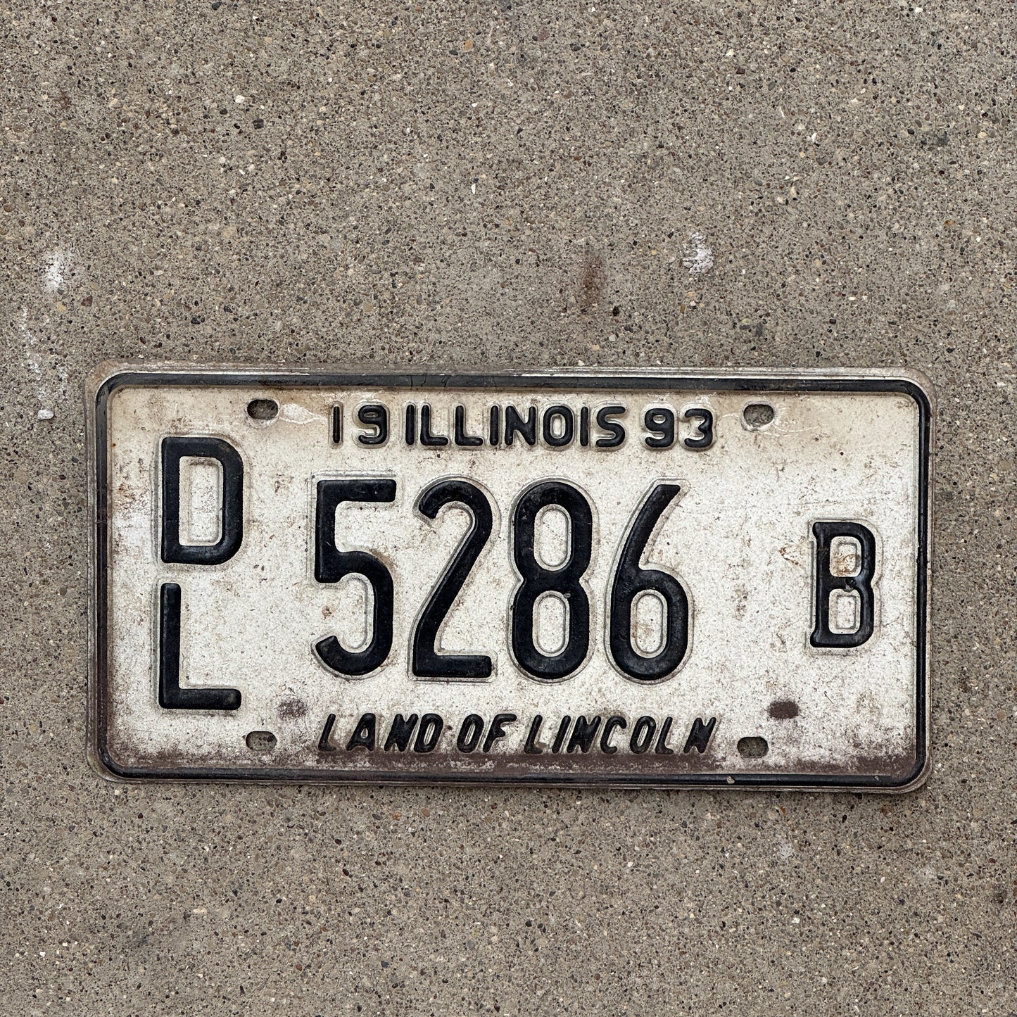 Photo of a 1993 Illinois Dealer License Plate Auto Tag 1 Vintage Garage 5286 B with original patina