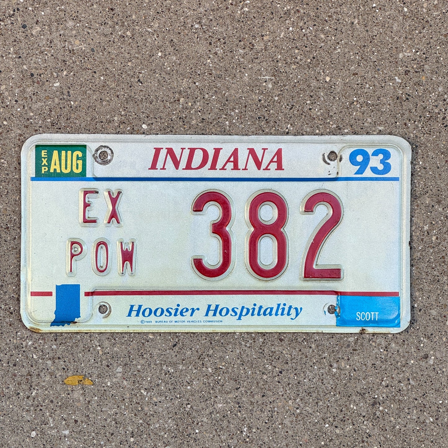 Photo of a 1993 Indiana Ex Prisoner of War License Plate Auto Tag Garage Decor Vintage POW 382 with original patina