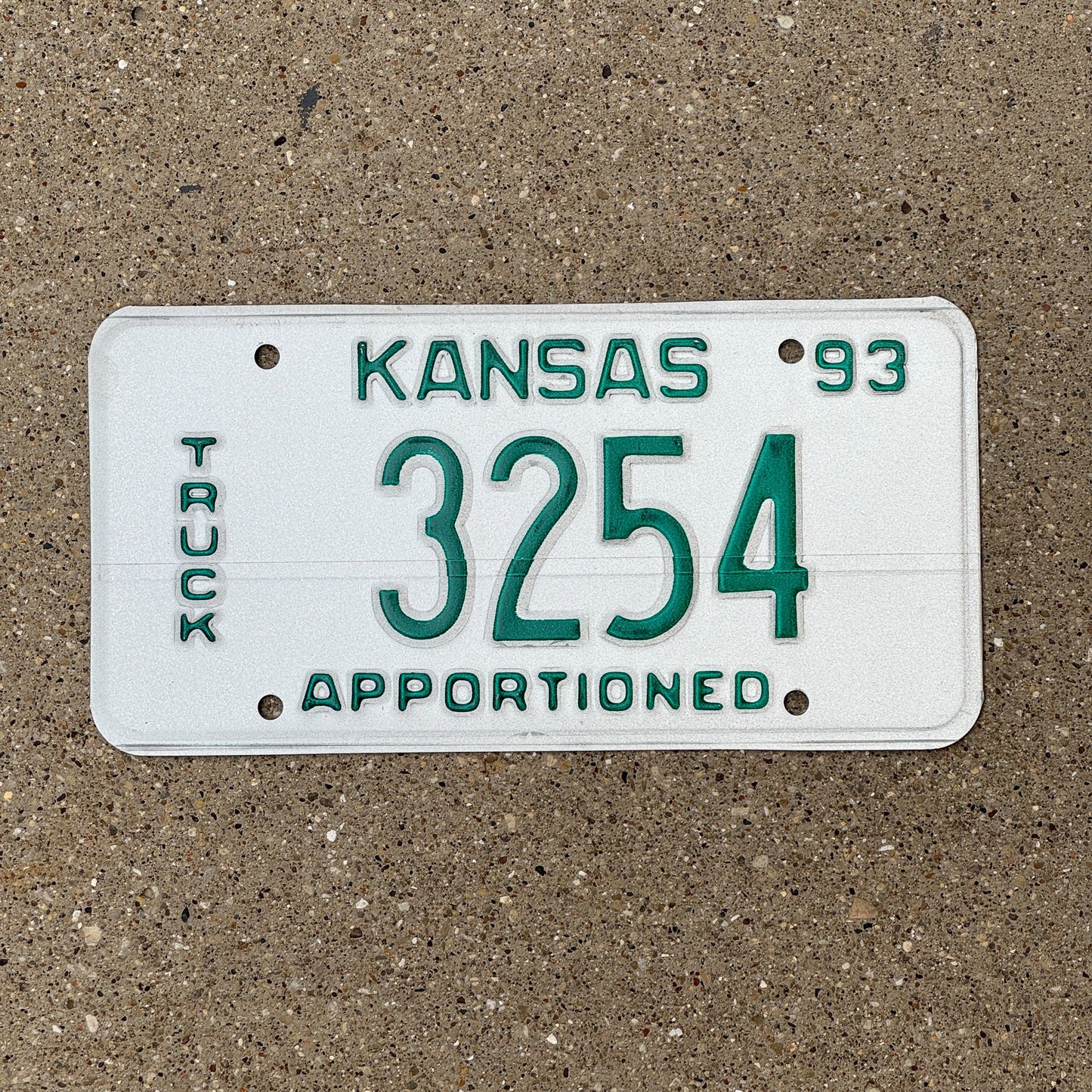 Photo of a 1993 Kansas Apportioned Truck Error License Plate Auto Tag Garage Decor Vintage Misprint 3254